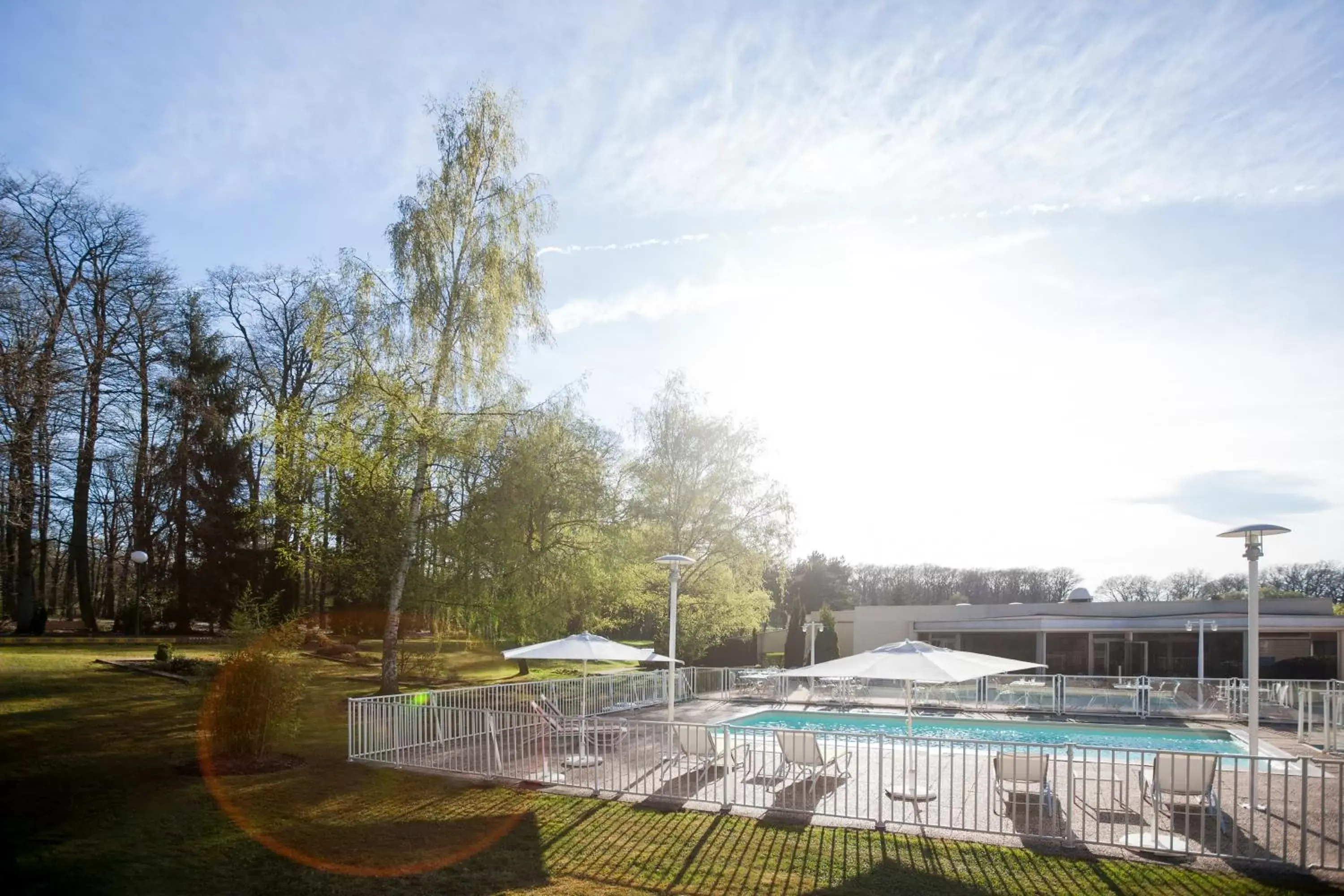 Garden, Swimming Pool in Novotel Mulhouse Bâle Fribourg