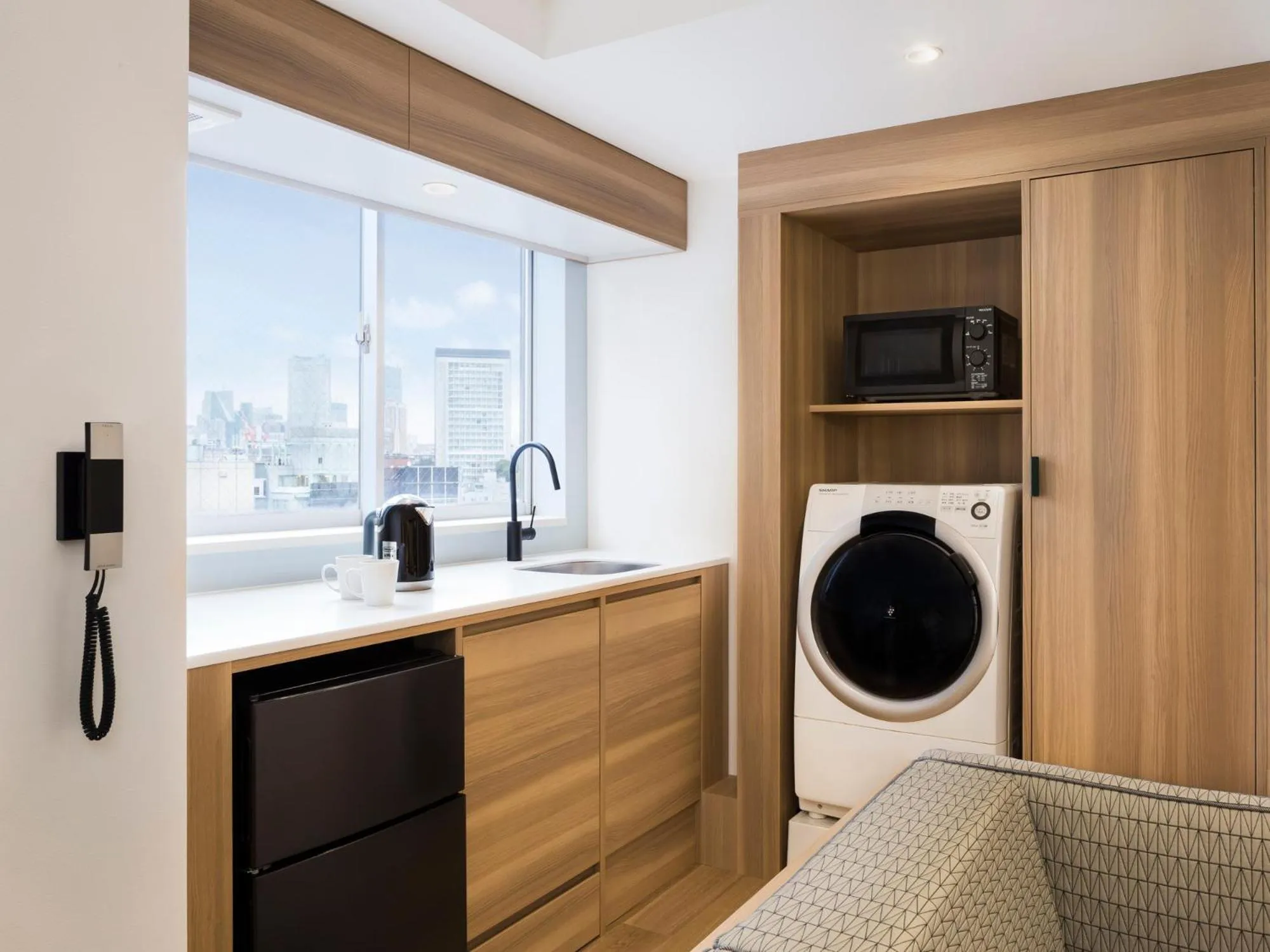 Kitchen or kitchenette in Tokyu Stay Shibuya Shin-Minamiguchi