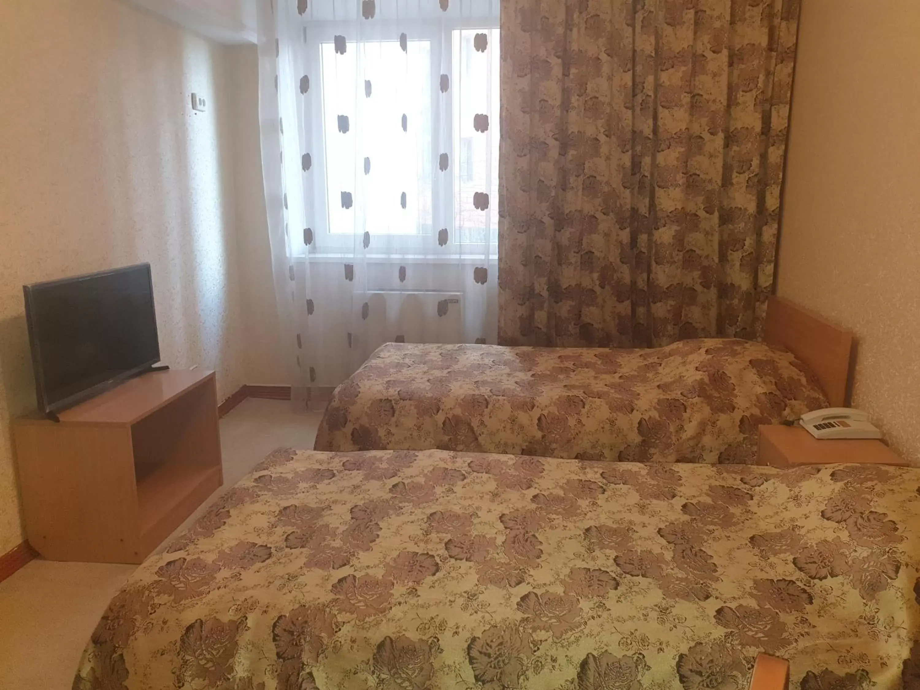 Bed in Dacia Hotel