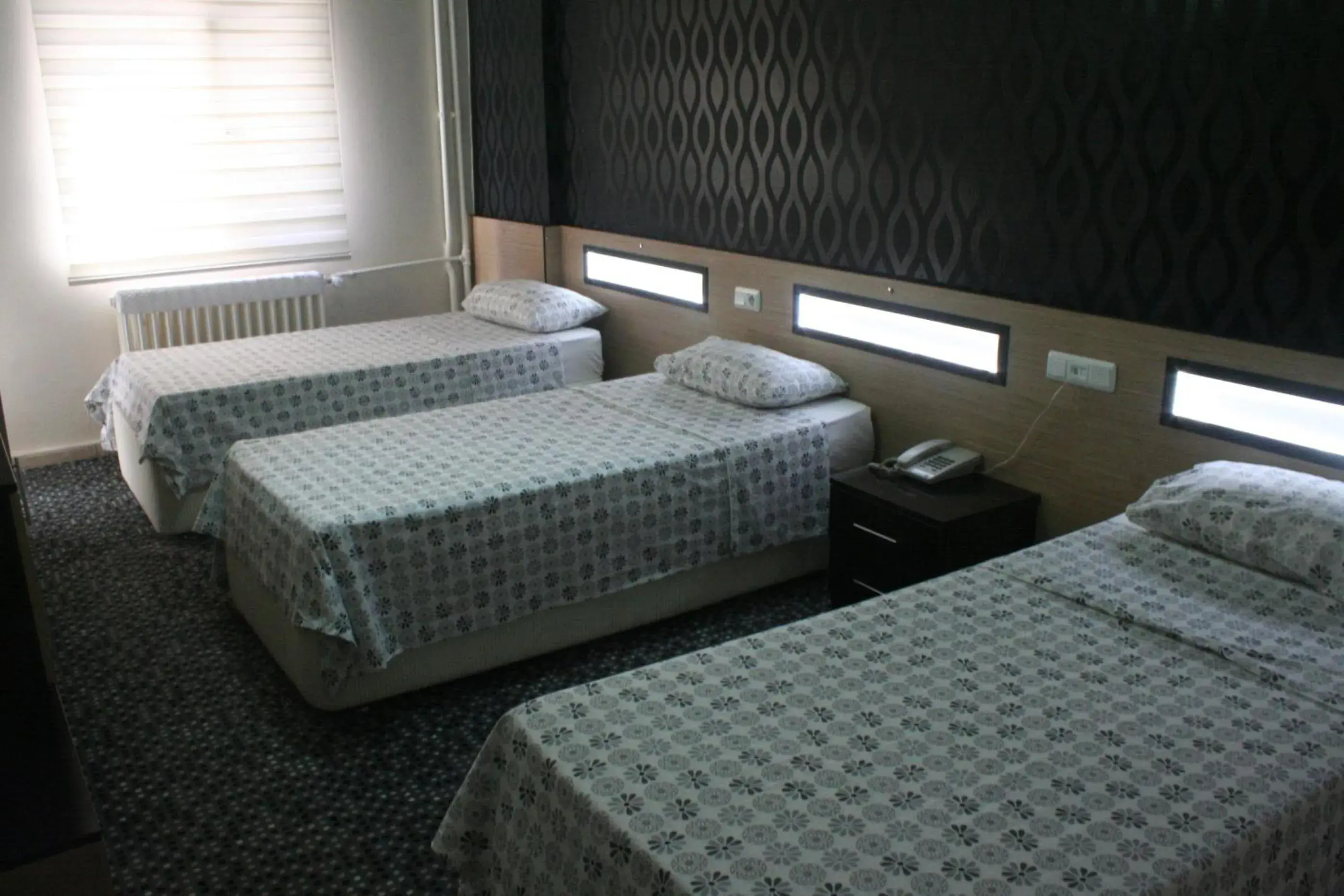 Bed in Yeni Kosk Esra Hotel