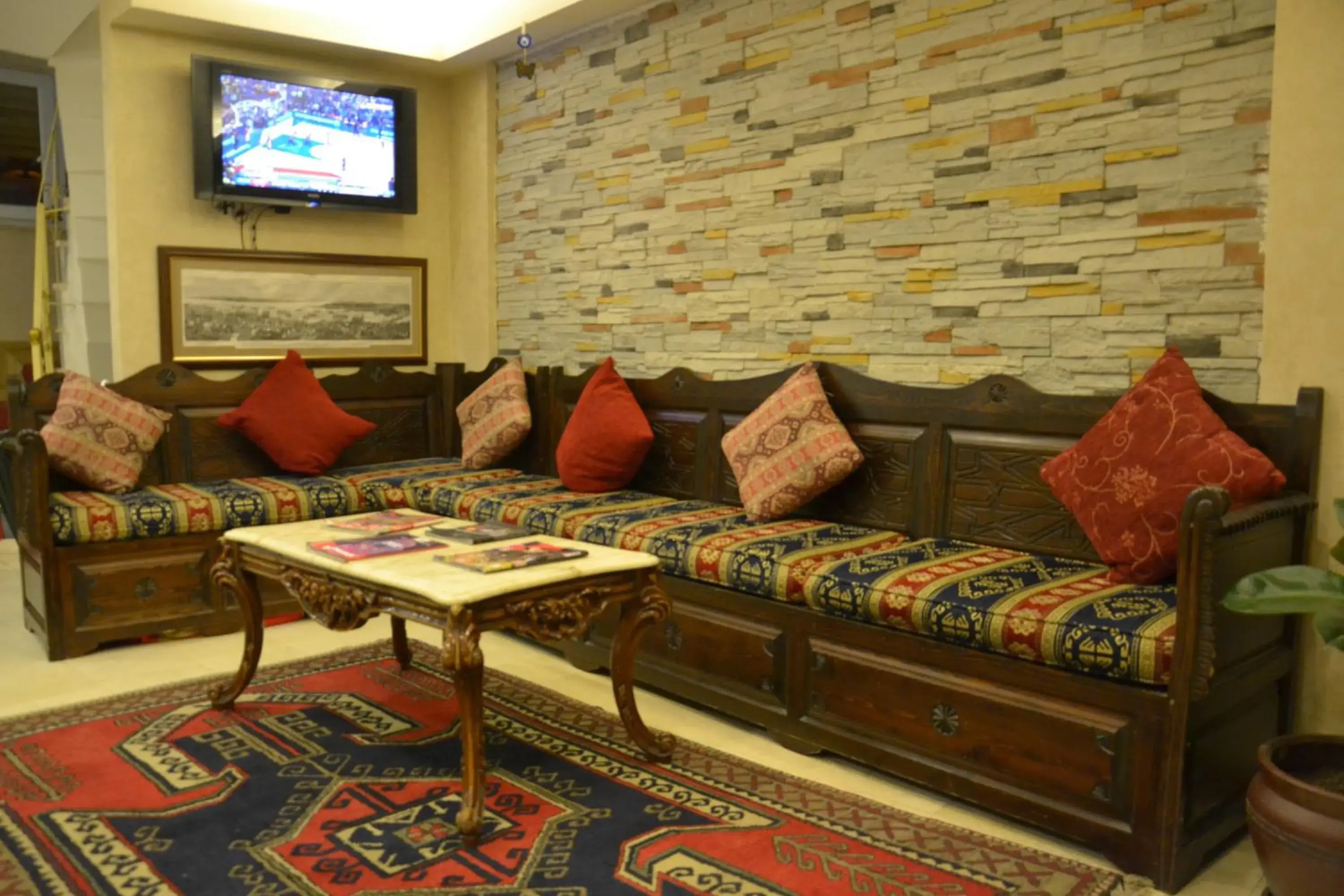 Communal lounge/ TV room, Seating Area in Kaftan Hotel