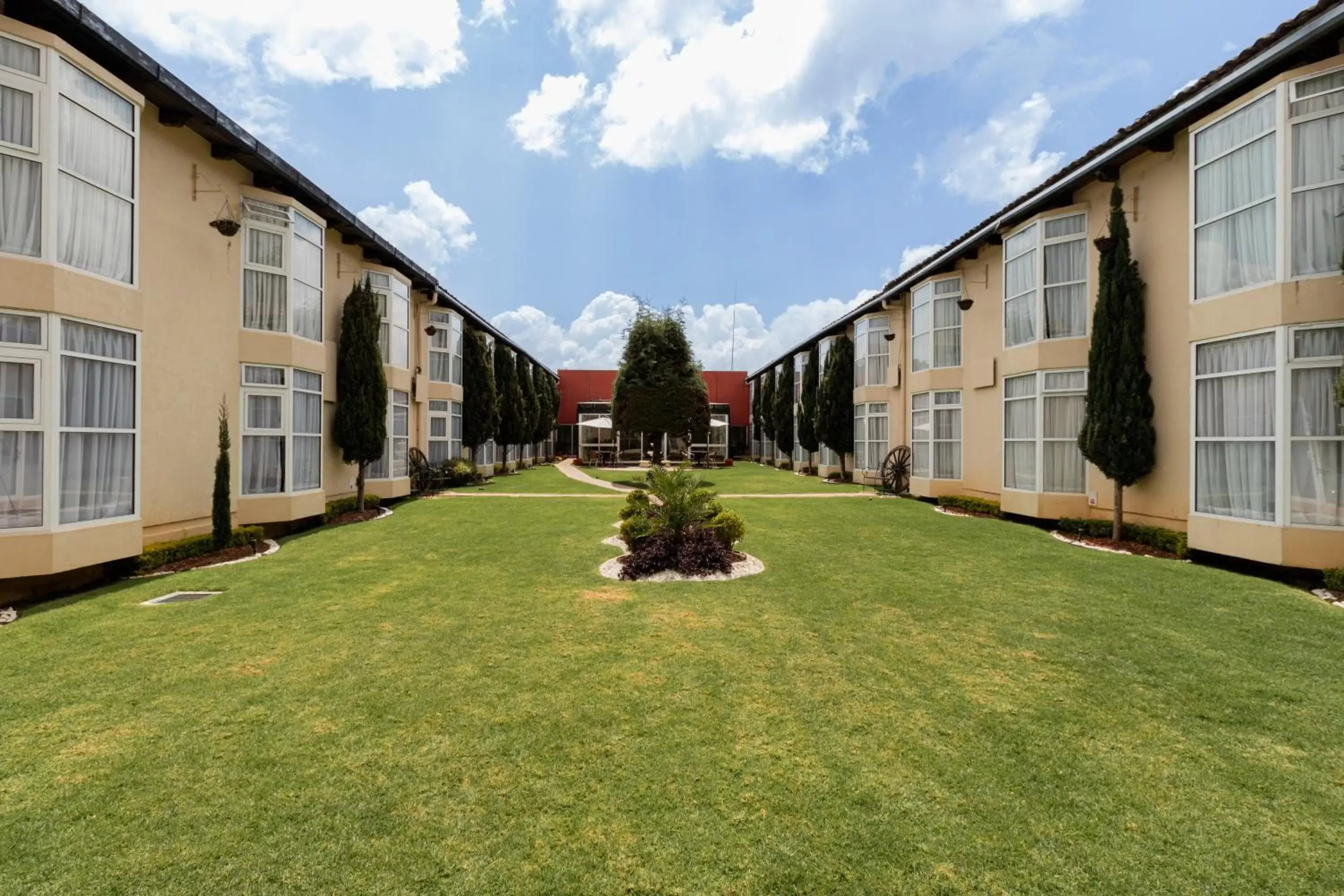 Property building, Garden in Hoteles Villa Mercedes San Cristobal