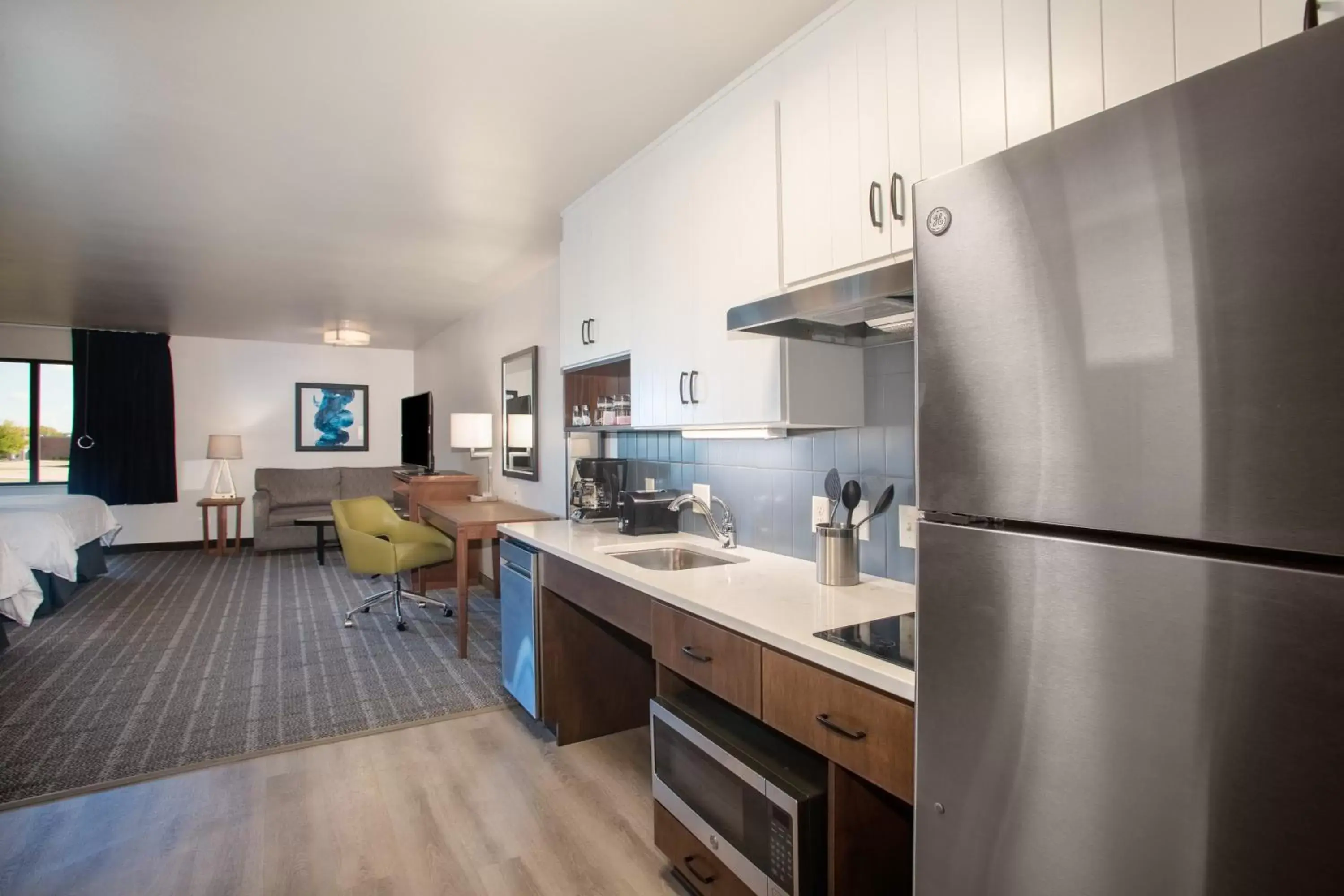 Photo of the whole room, Kitchen/Kitchenette in Staybridge Suites - Sioux Falls Southwest, an IHG Hotel