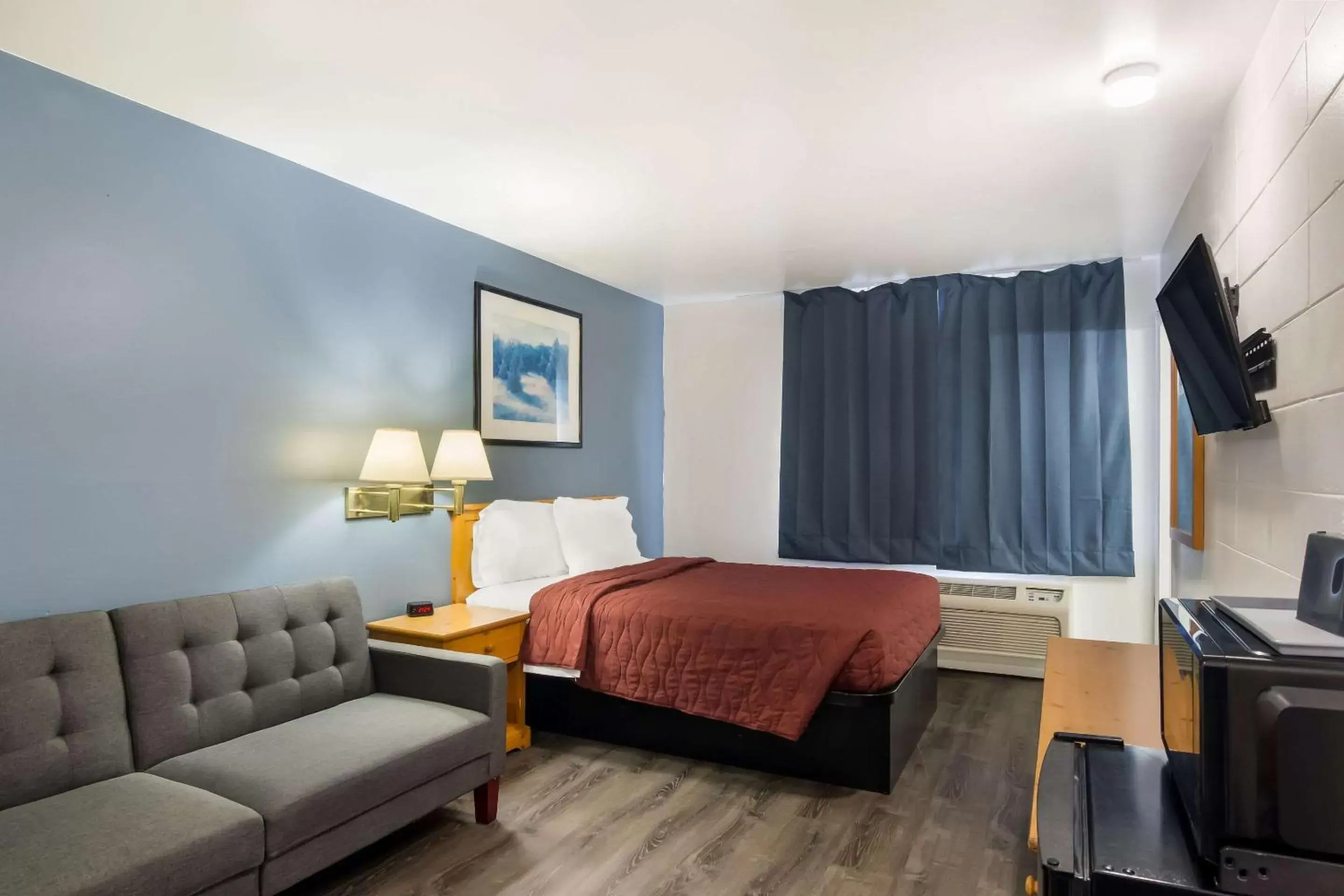 Bedroom in Rodeway Inn & Suites Sidney Historic Downtown I-80