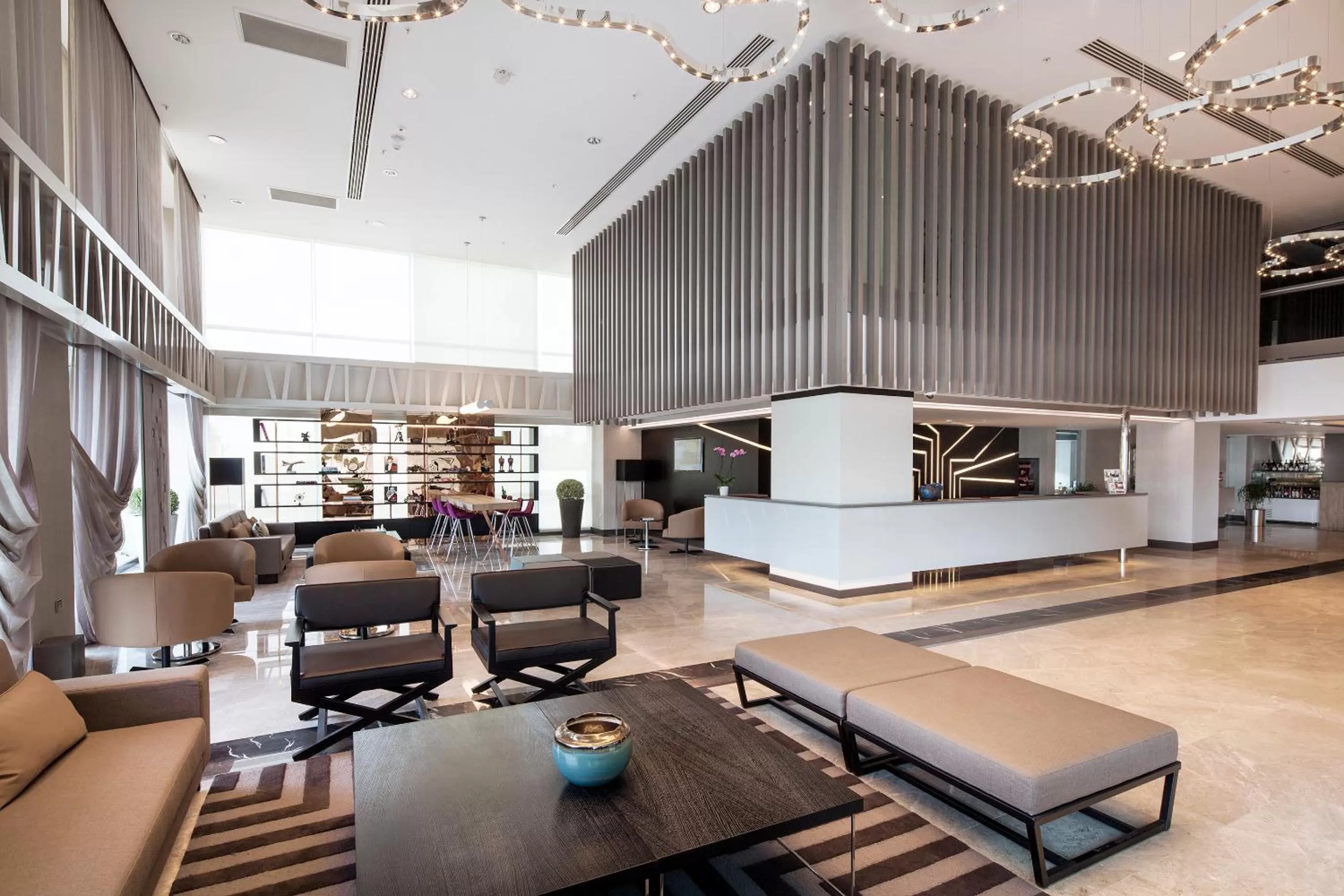 Lobby or reception in Ramada Hotel & Suites by Wyndham Izmir Kemalpasa