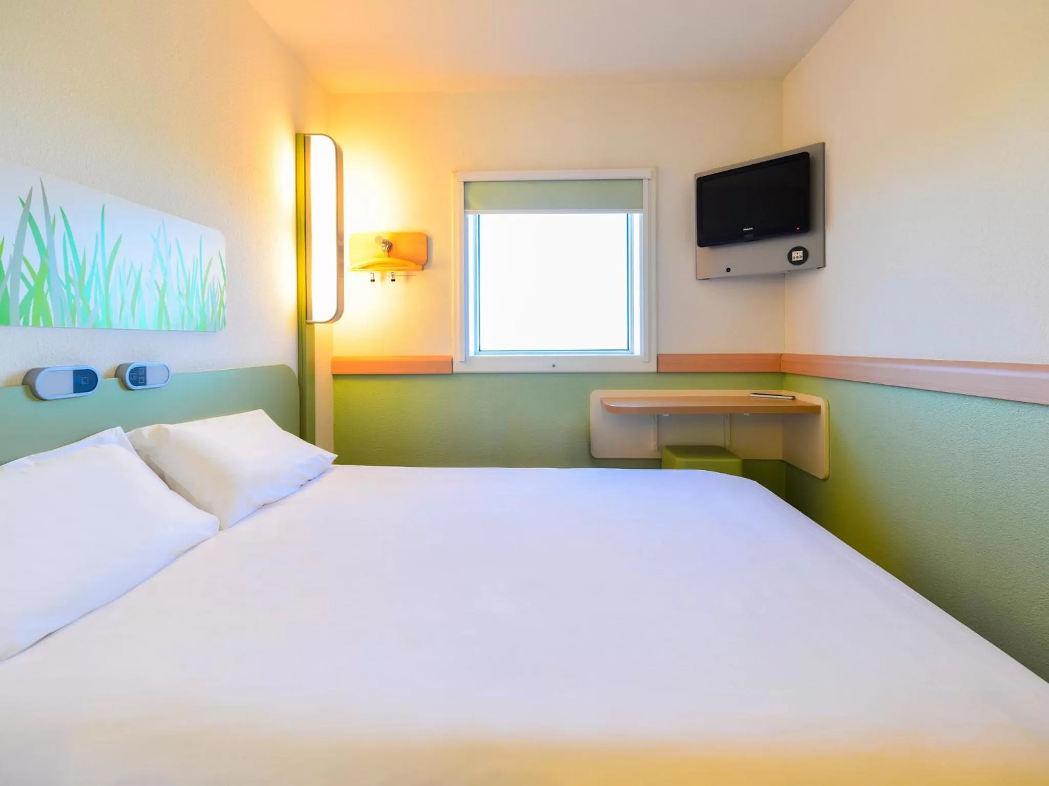 Photo of the whole room, Bed in ibis budget Parauapebas