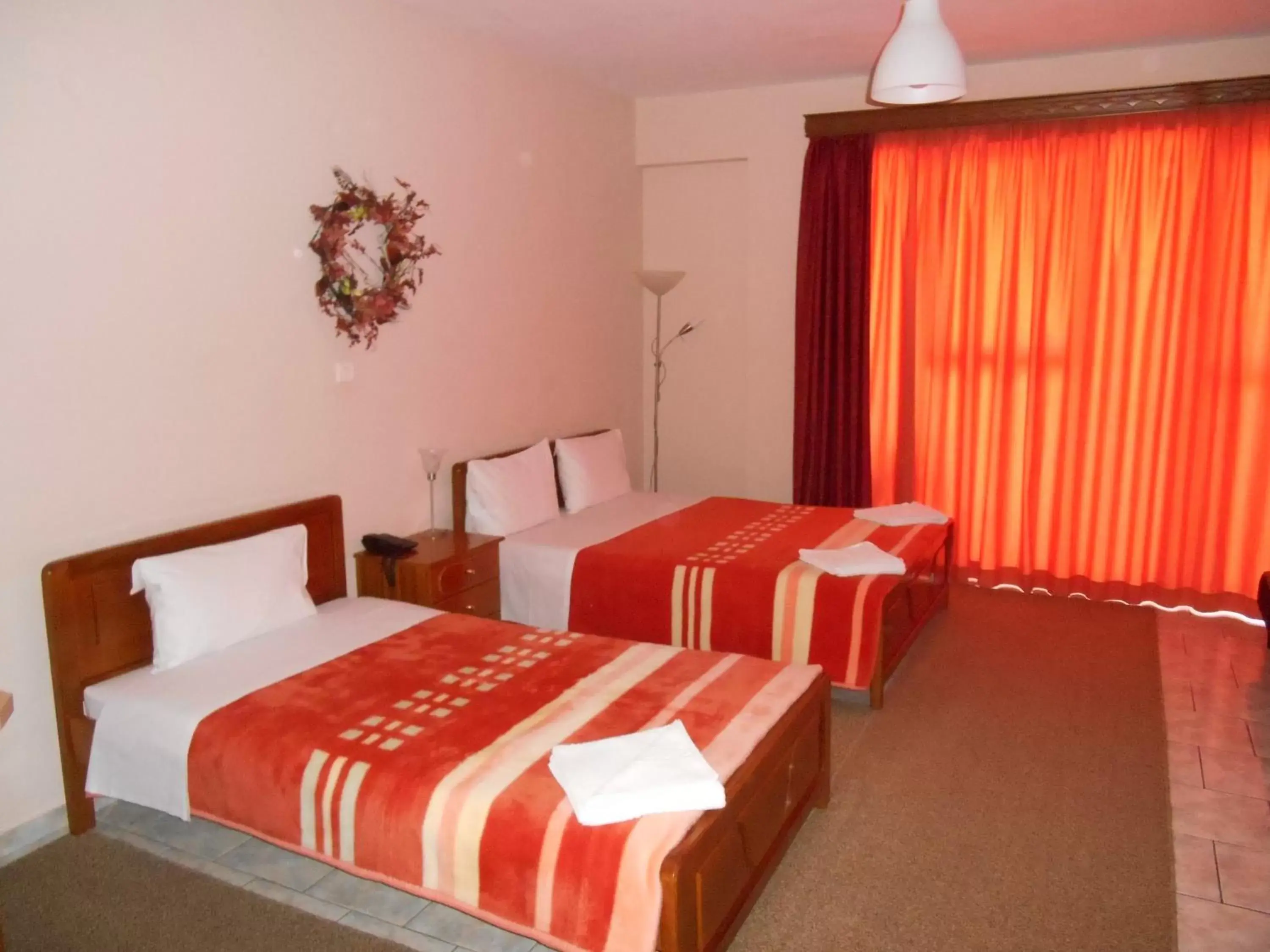 Bed in Hotel Vasilis