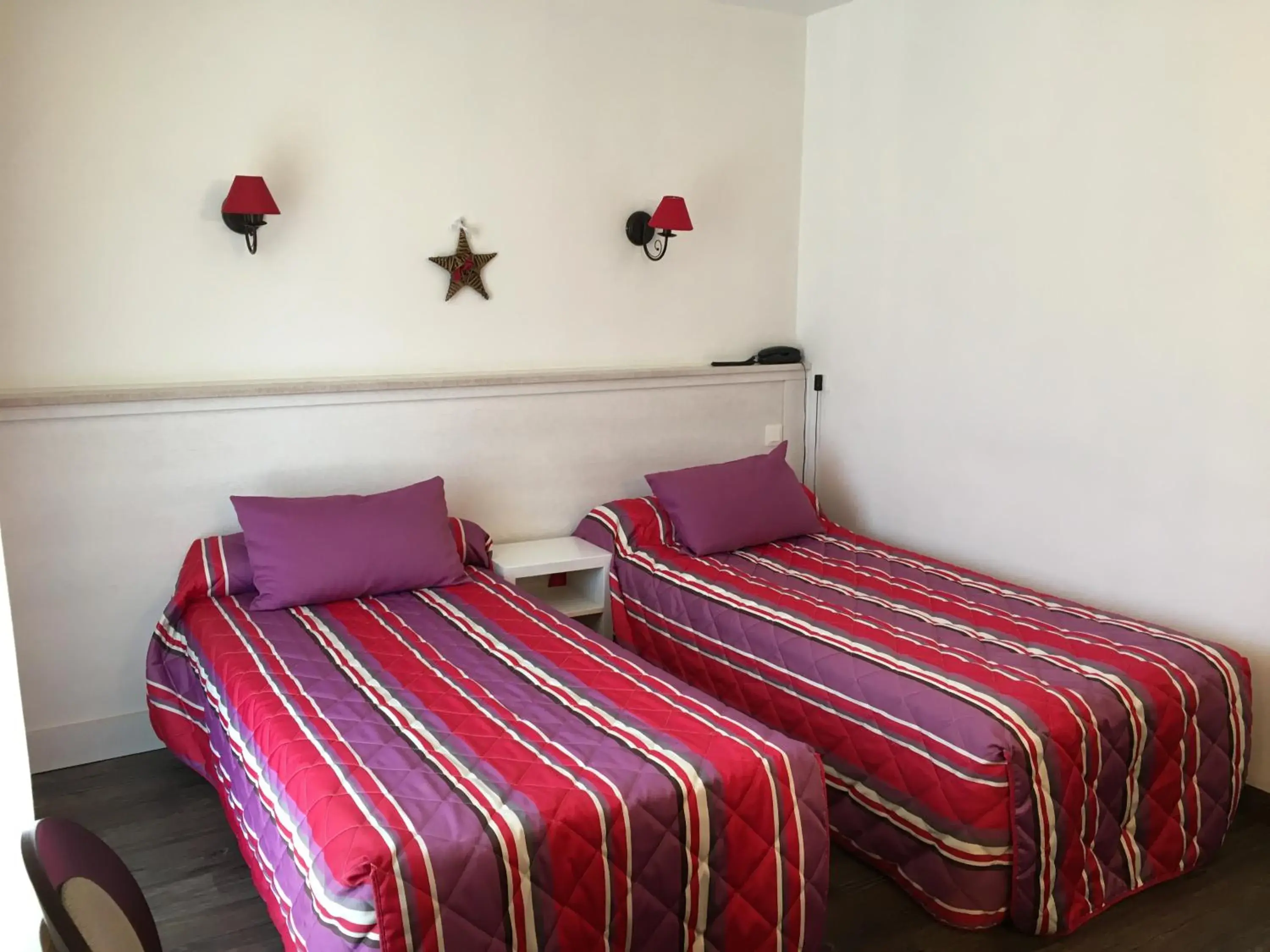Bed in Le Catinat Fleuri