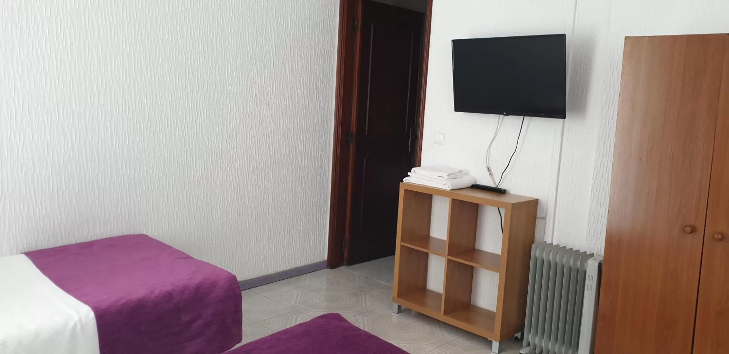 Bed in Hotel Palmeira