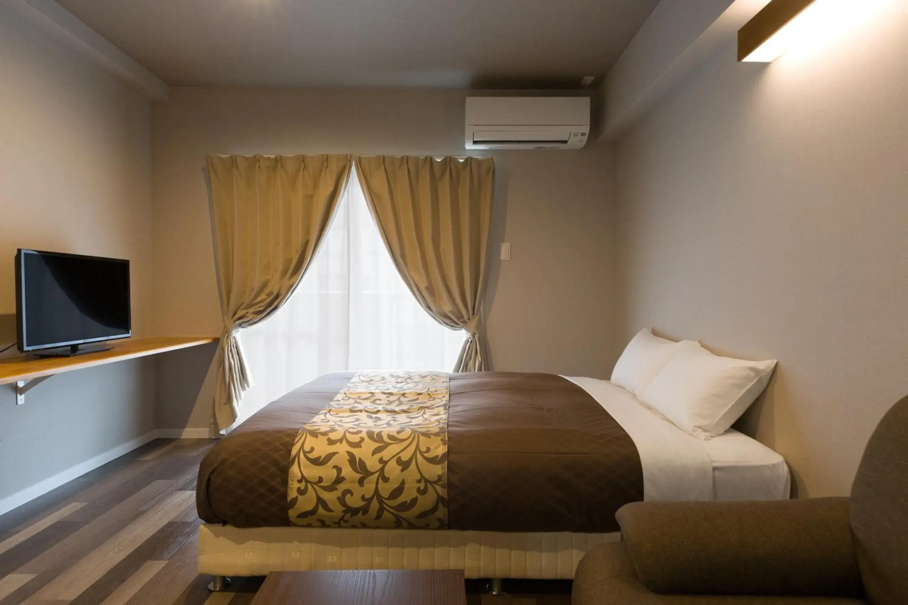 Bedroom, Bed in Mr. Kinjo in NISHIZAKI