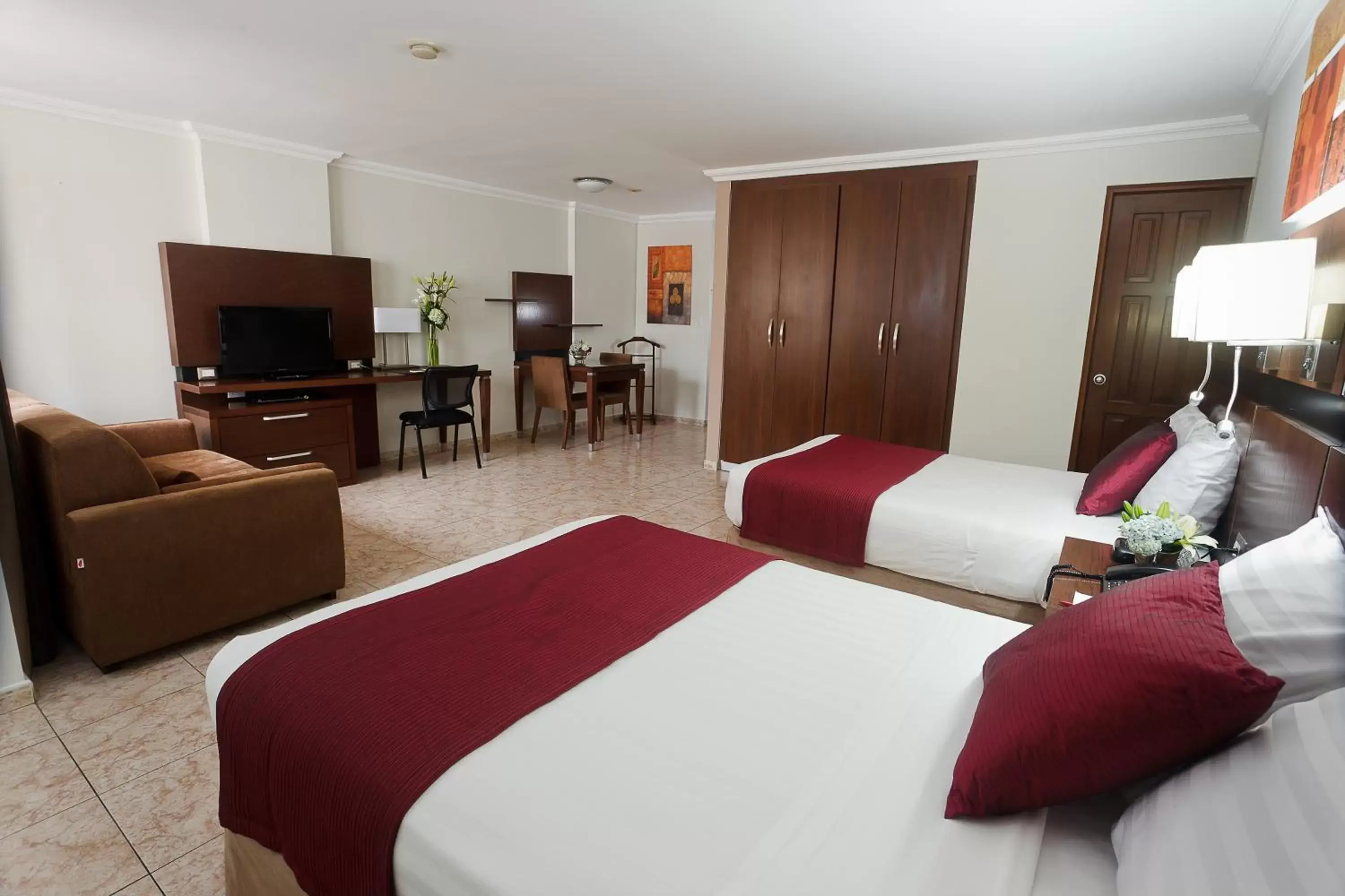 Bedroom in Hotel Coral Suites