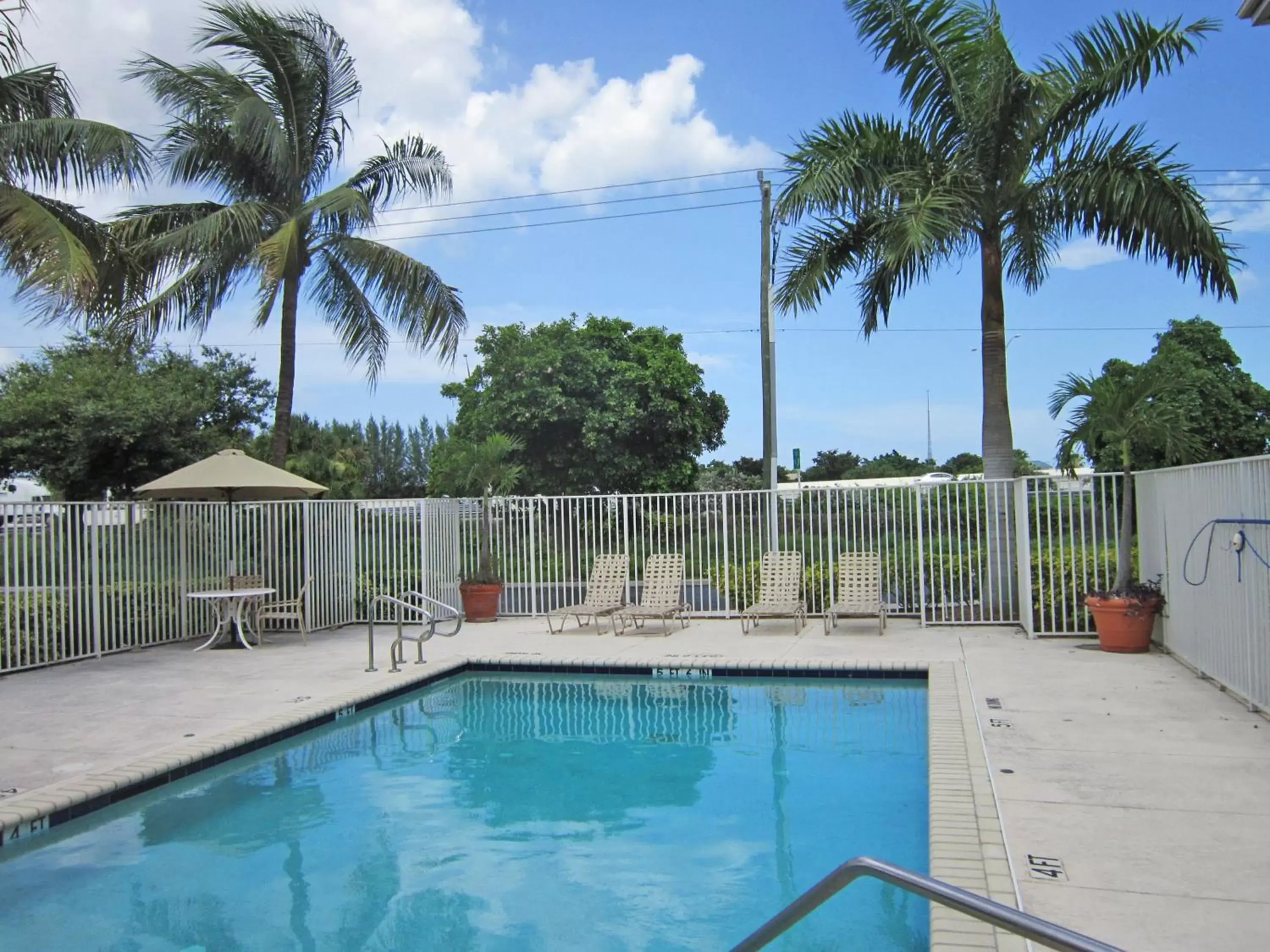 Swimming Pool in Extended Stay America Suites - West Palm Beach - Northpoint Corporate Park