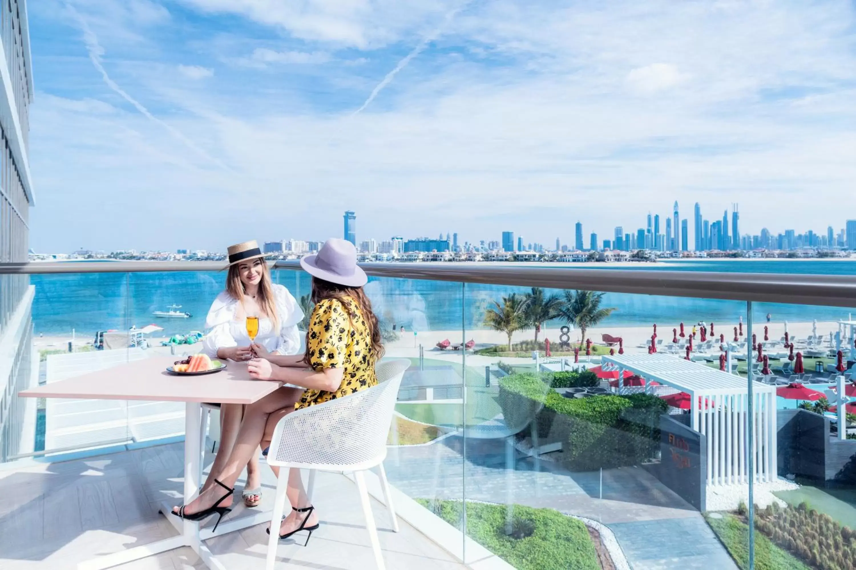 Balcony/Terrace, Swimming Pool in Th8 Palm Dubai Beach Resort Vignette Collection, an IHG hotel