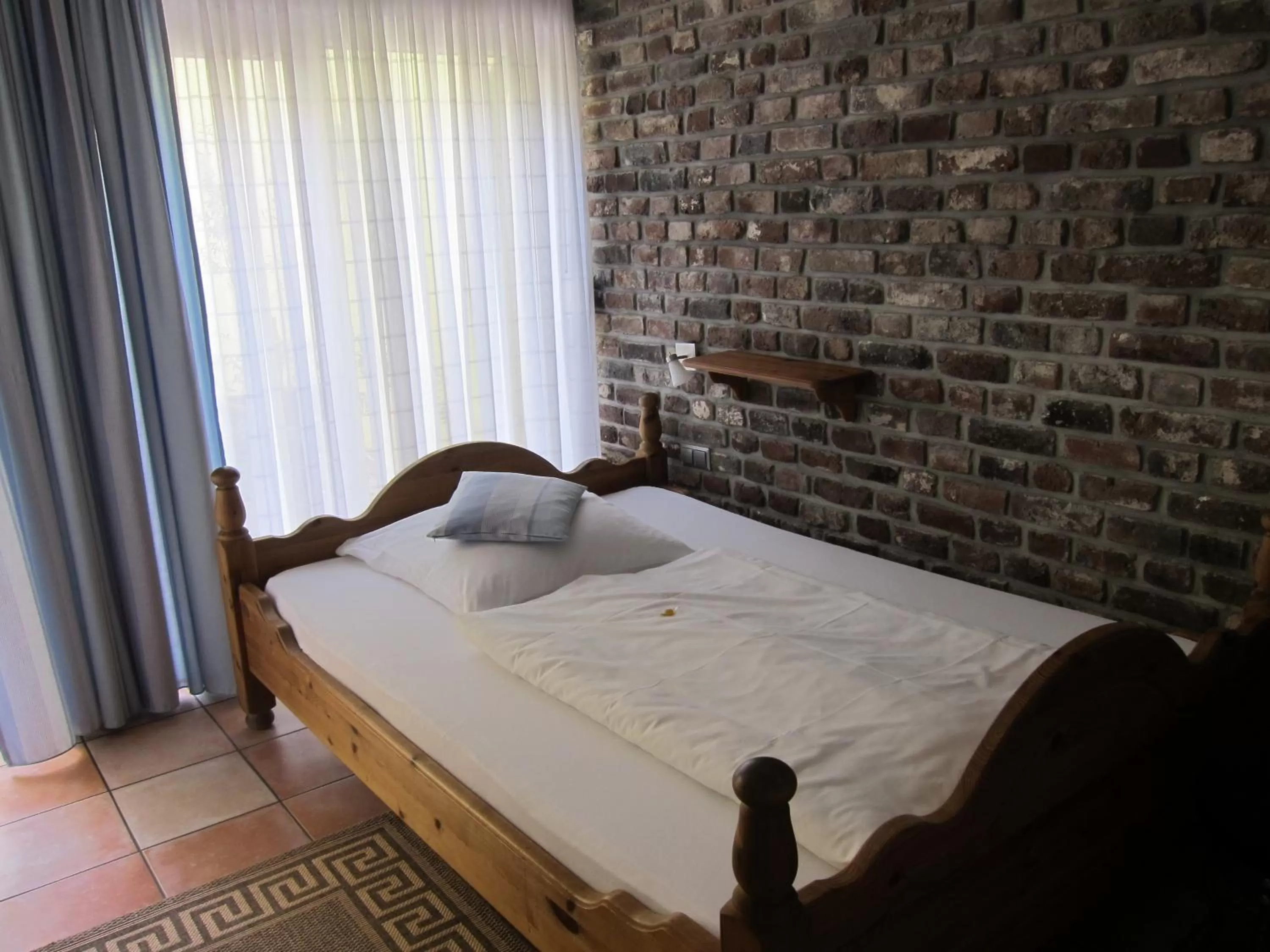Photo of the whole room, Bed in Boutique-garni Hotel Papillon