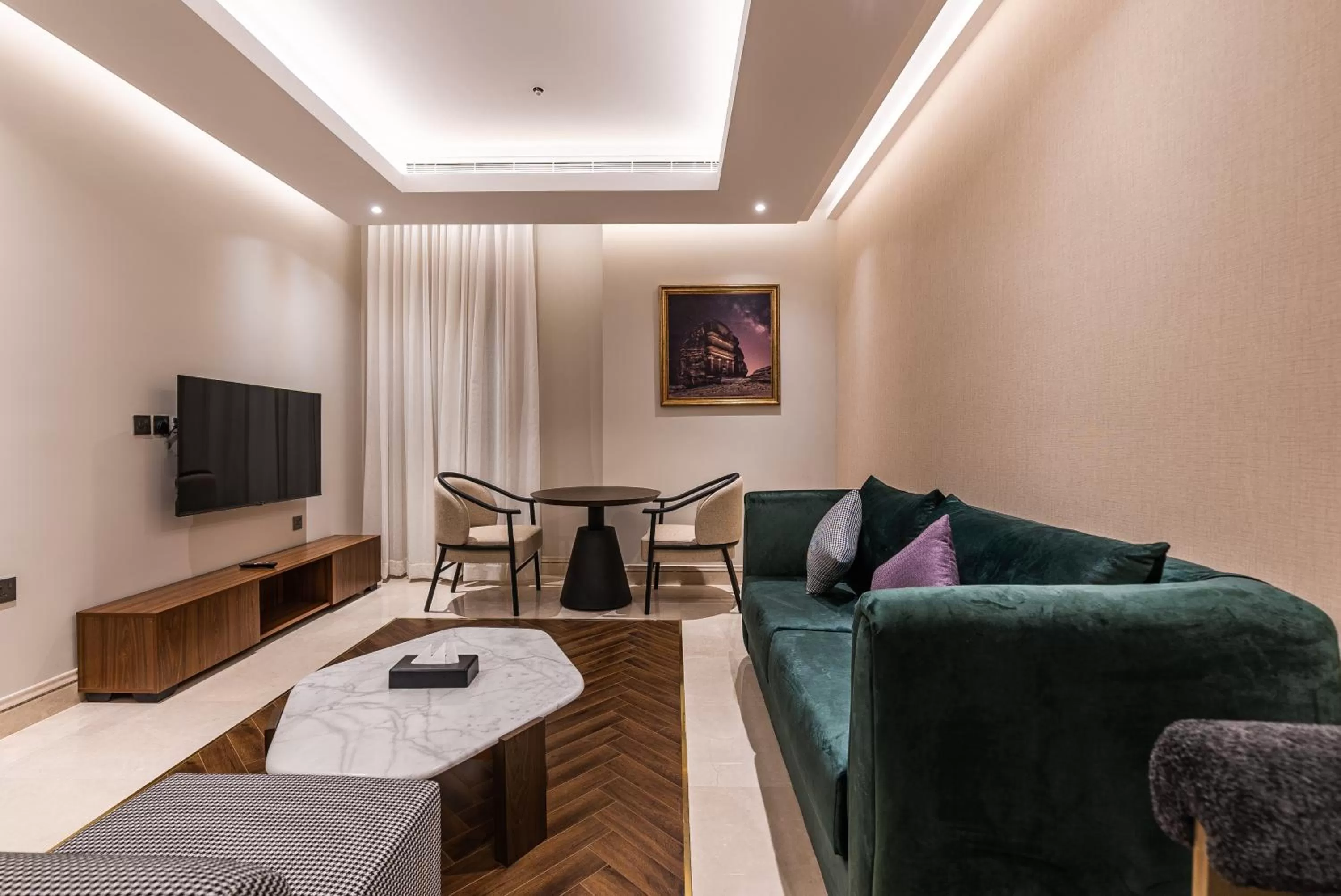 Communal lounge/ TV room in Tura Hotel Olaya - فندق ترى العليا