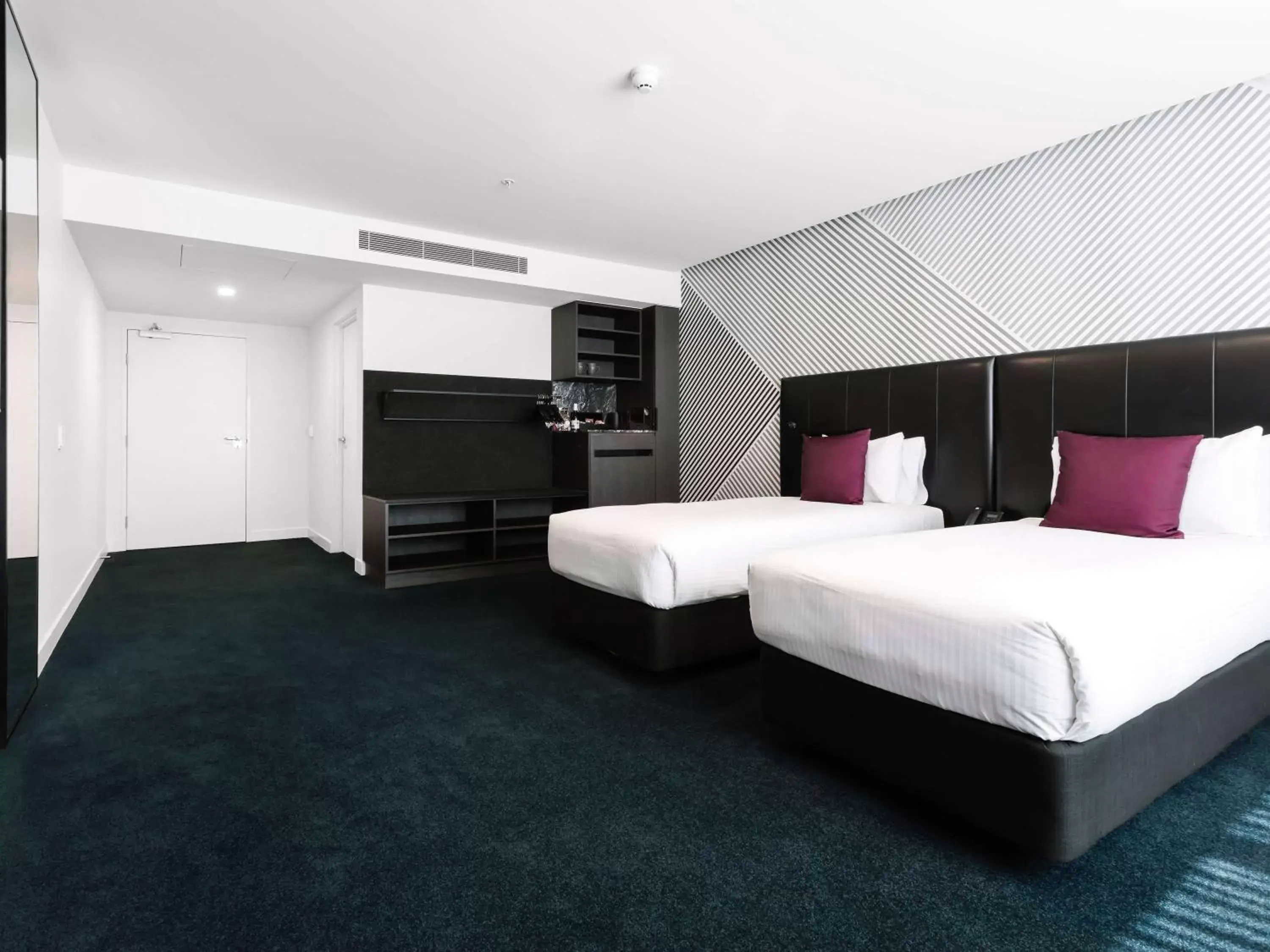 Bedroom in Movenpick Hotel Melbourne On Spencer