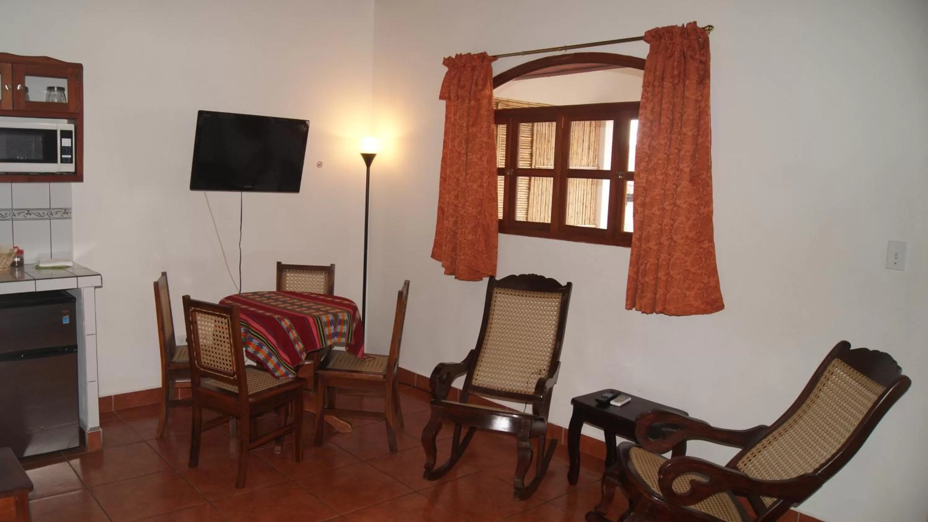 Living room in Hotel Cacique Adiact