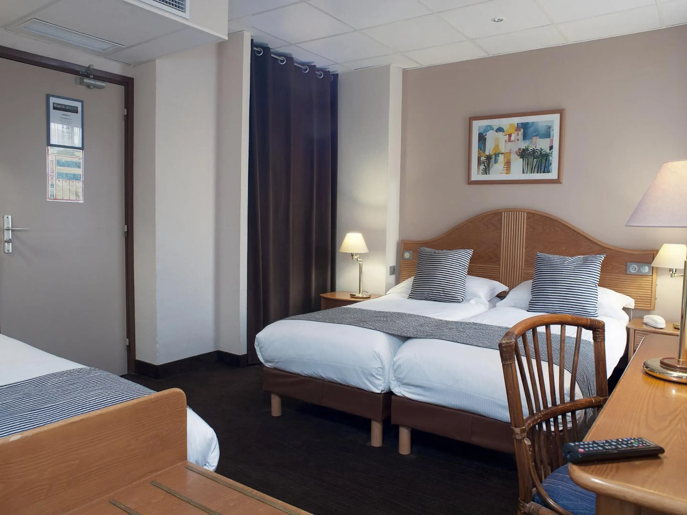 Photo of the whole room, Bed in Hôtel Esprit d'Azur Photo of the whole room, Bed in Hôtel Esprit d'Azur