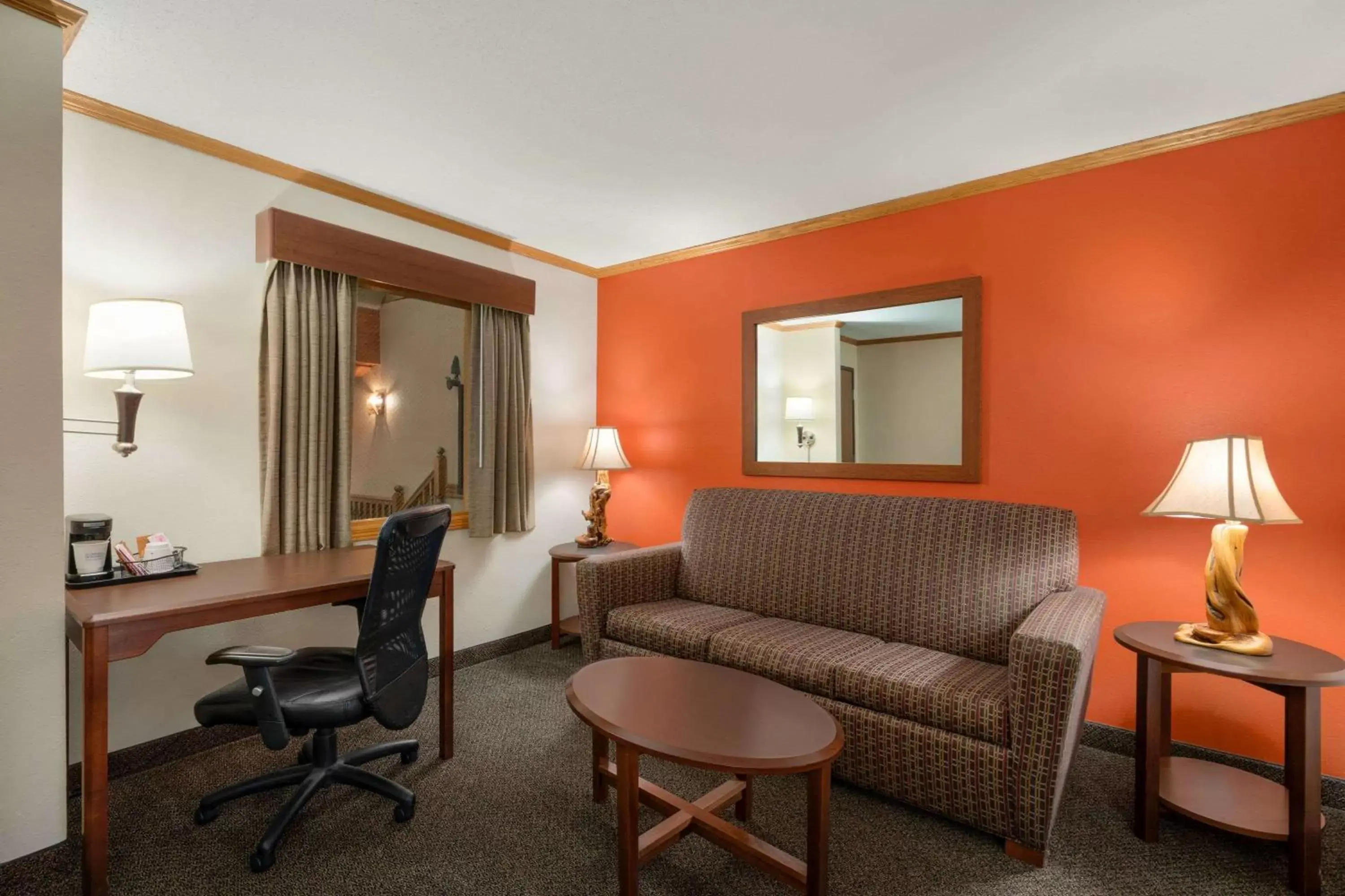 Photo of the whole room, Seating Area in AmericInn by Wyndham Virginia