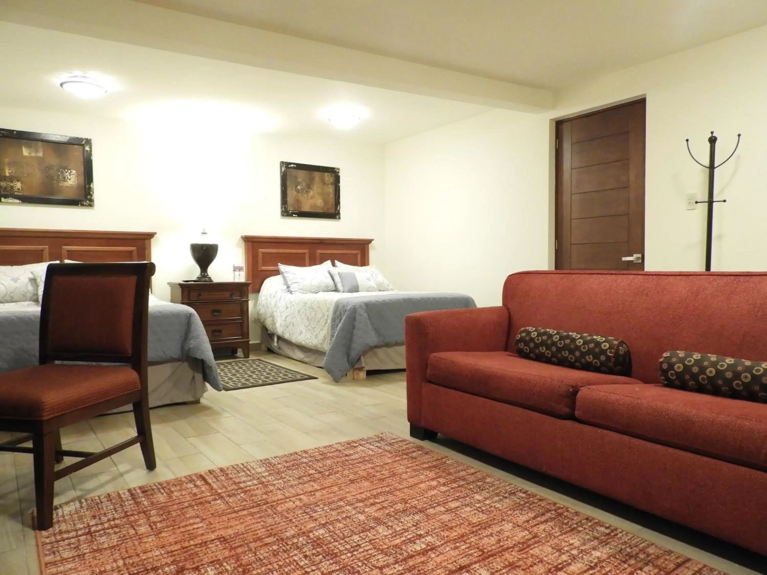 Bed, Seating Area in Casona San Cayetano Suites & Lofts by Lunian