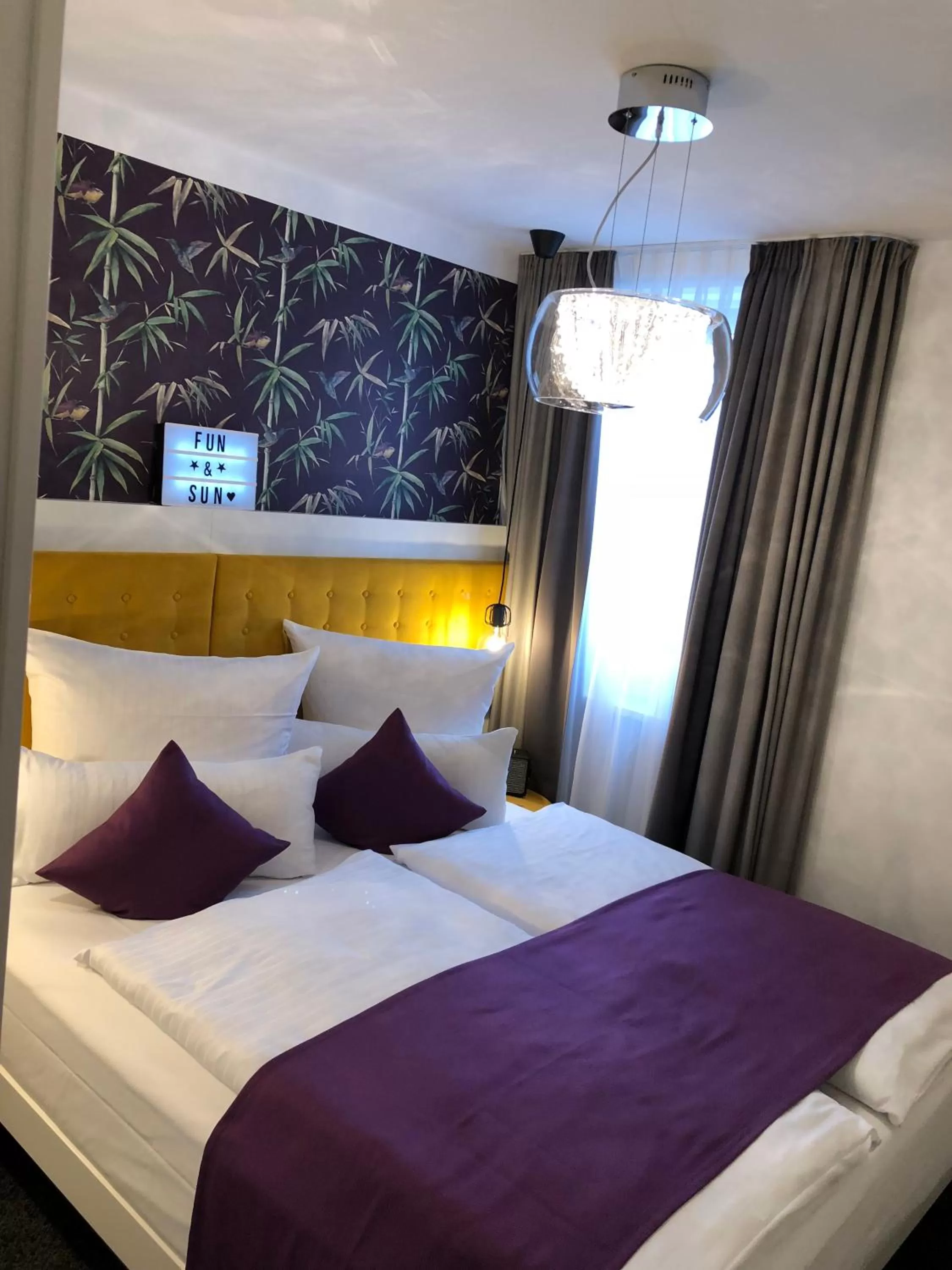 Bed in Hotel Mirabell by Maier Privathotels