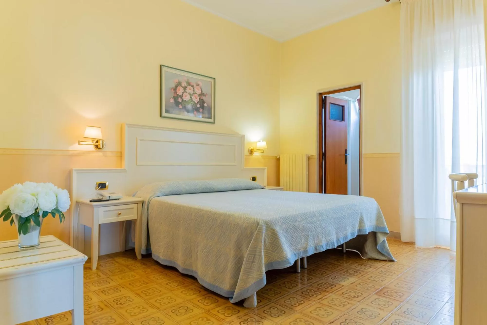 Bed in Hotel Riviera