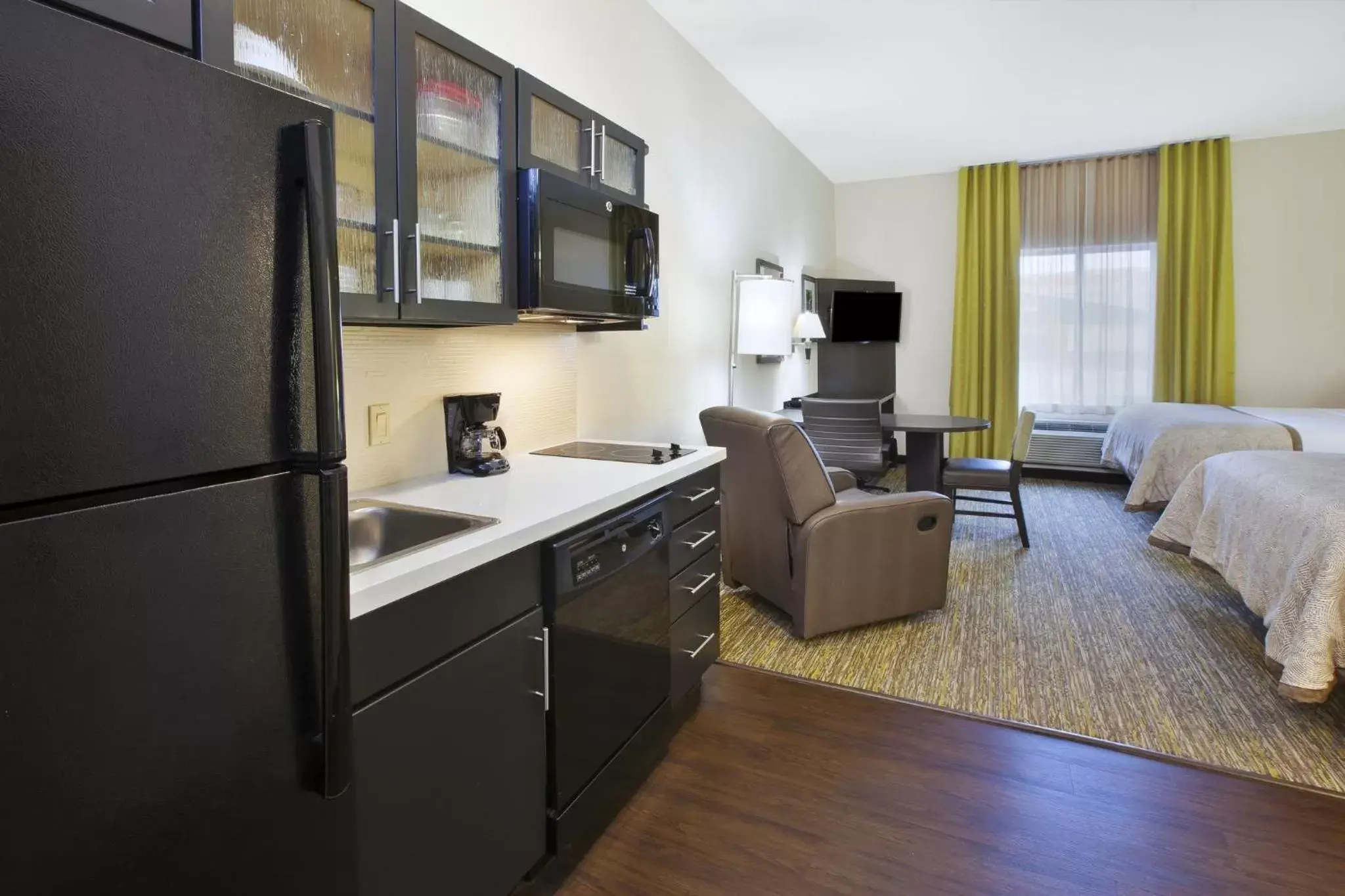 Photo of the whole room, Kitchen/Kitchenette in Candlewood Suites MORGANTOWN-UNIV WEST VIRGINIA, an IHG Hotel
