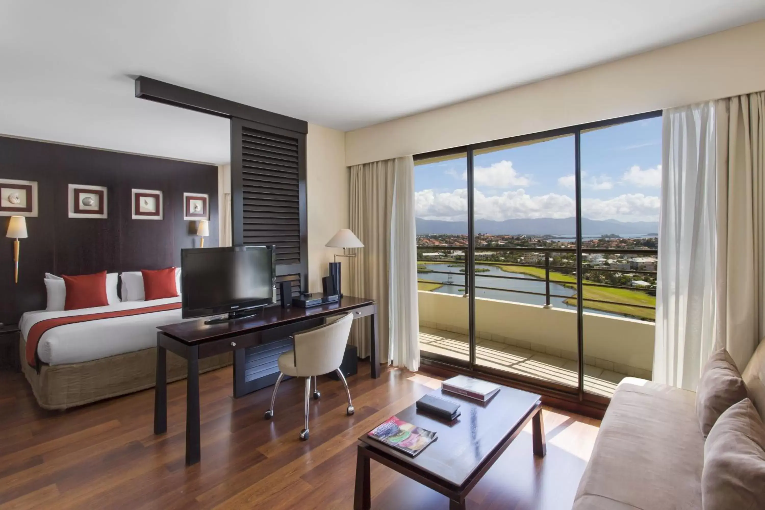 Photo of the whole room, TV/Entertainment Center in Ramada Hotel & Suites by Wyndham Noumea