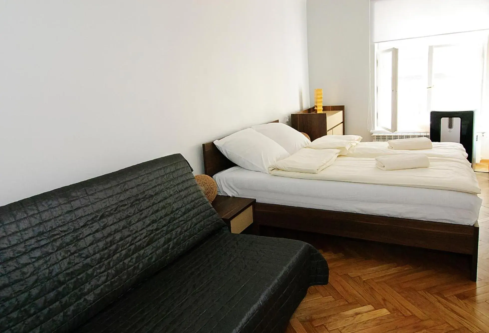 Bed in P&J Tourist Apartments