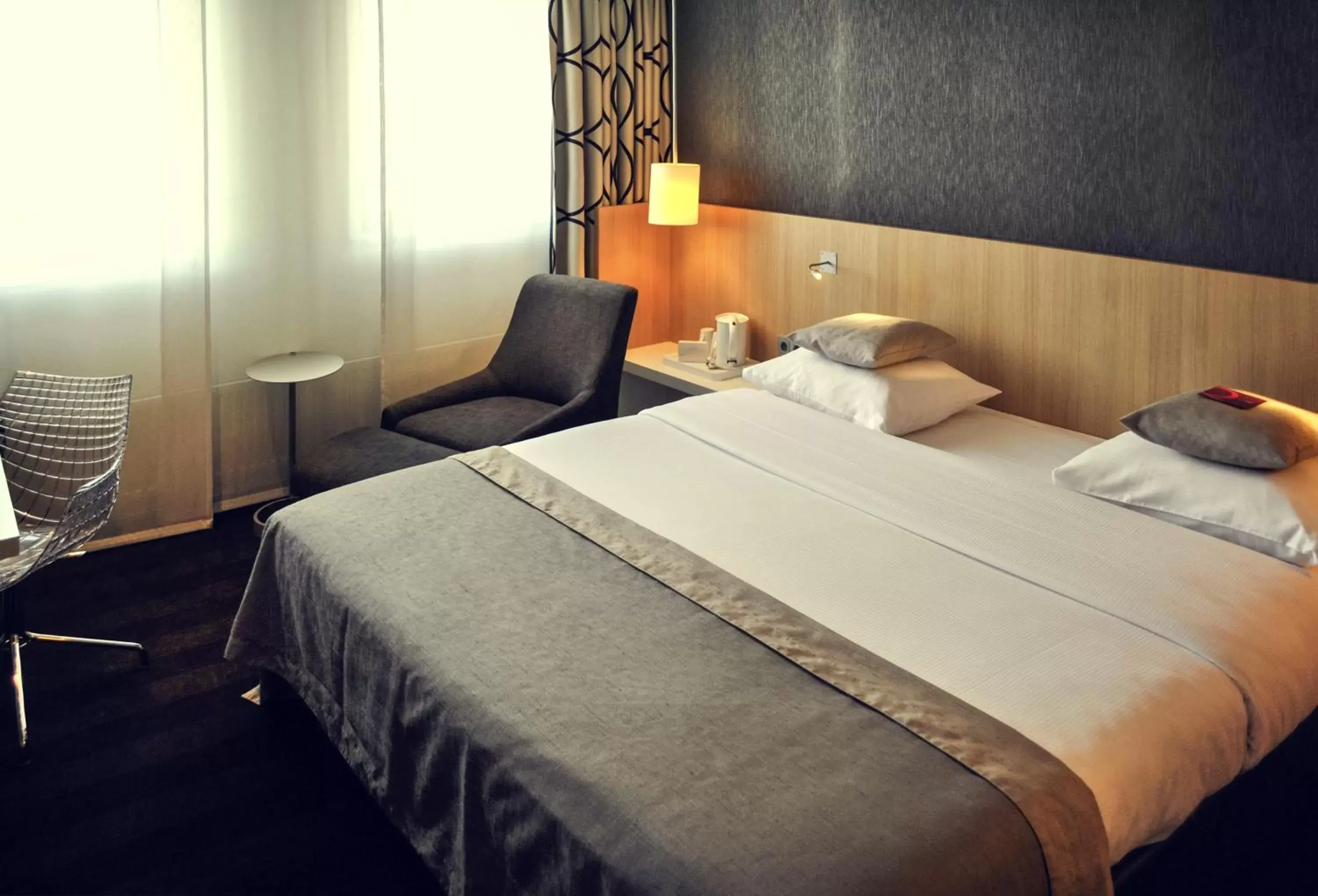 Bed in Mercure Amsterdam City Hotel