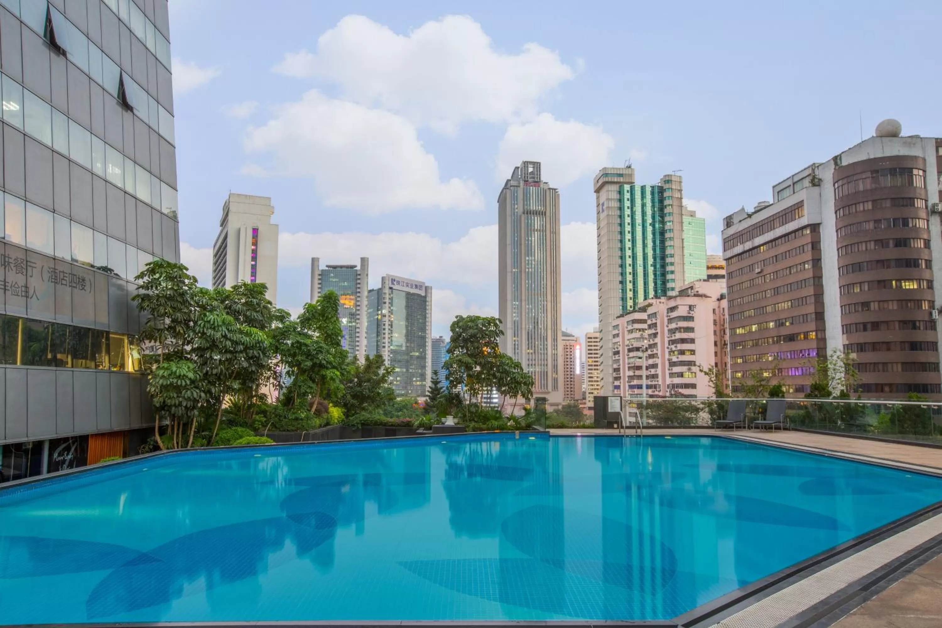 Swimming pool in Crowne Plaza Guangzhou City Centre by IHG