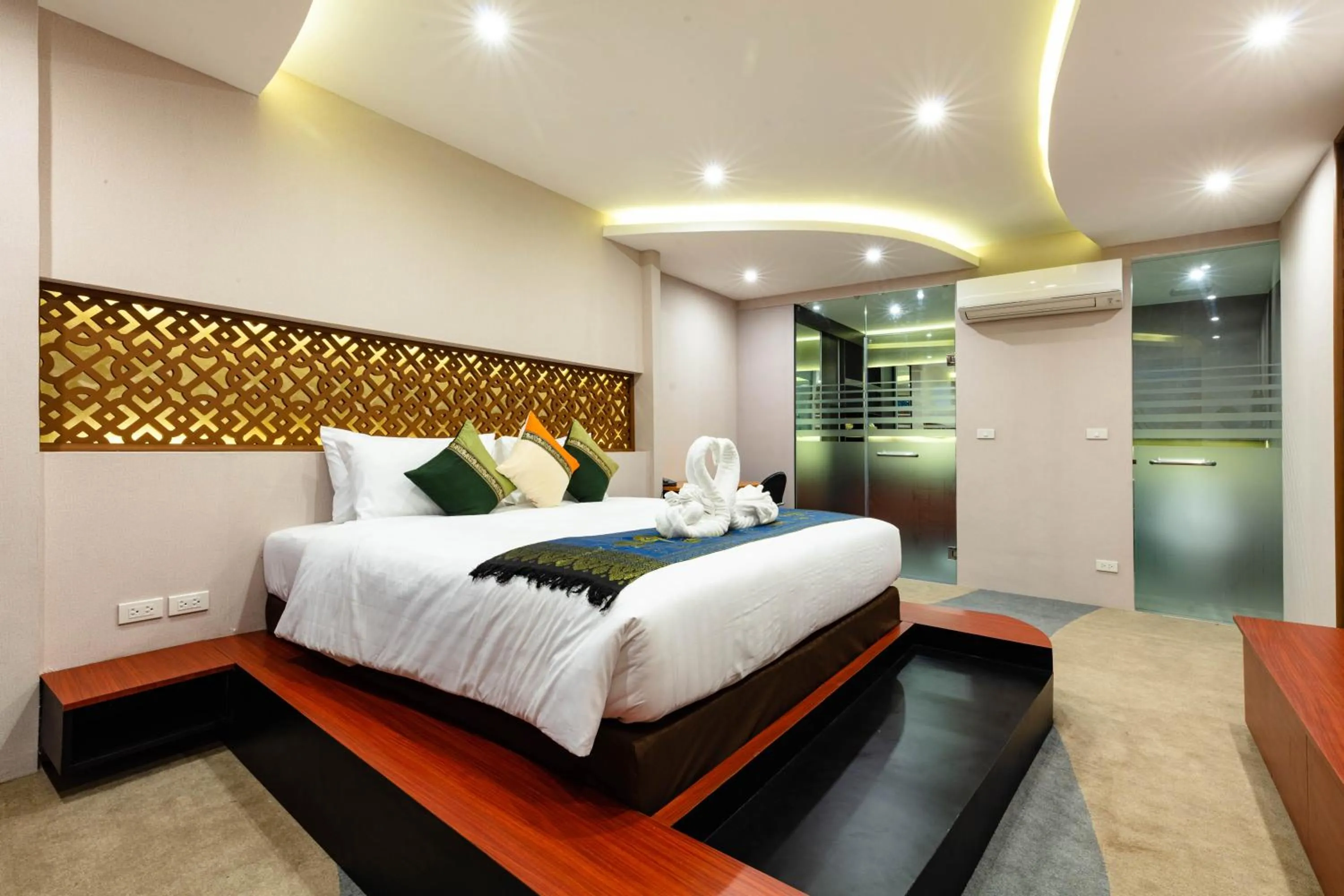 Bedroom, Bed in Royal Phawadee Village Patong - 2 Minutes walk to the beach