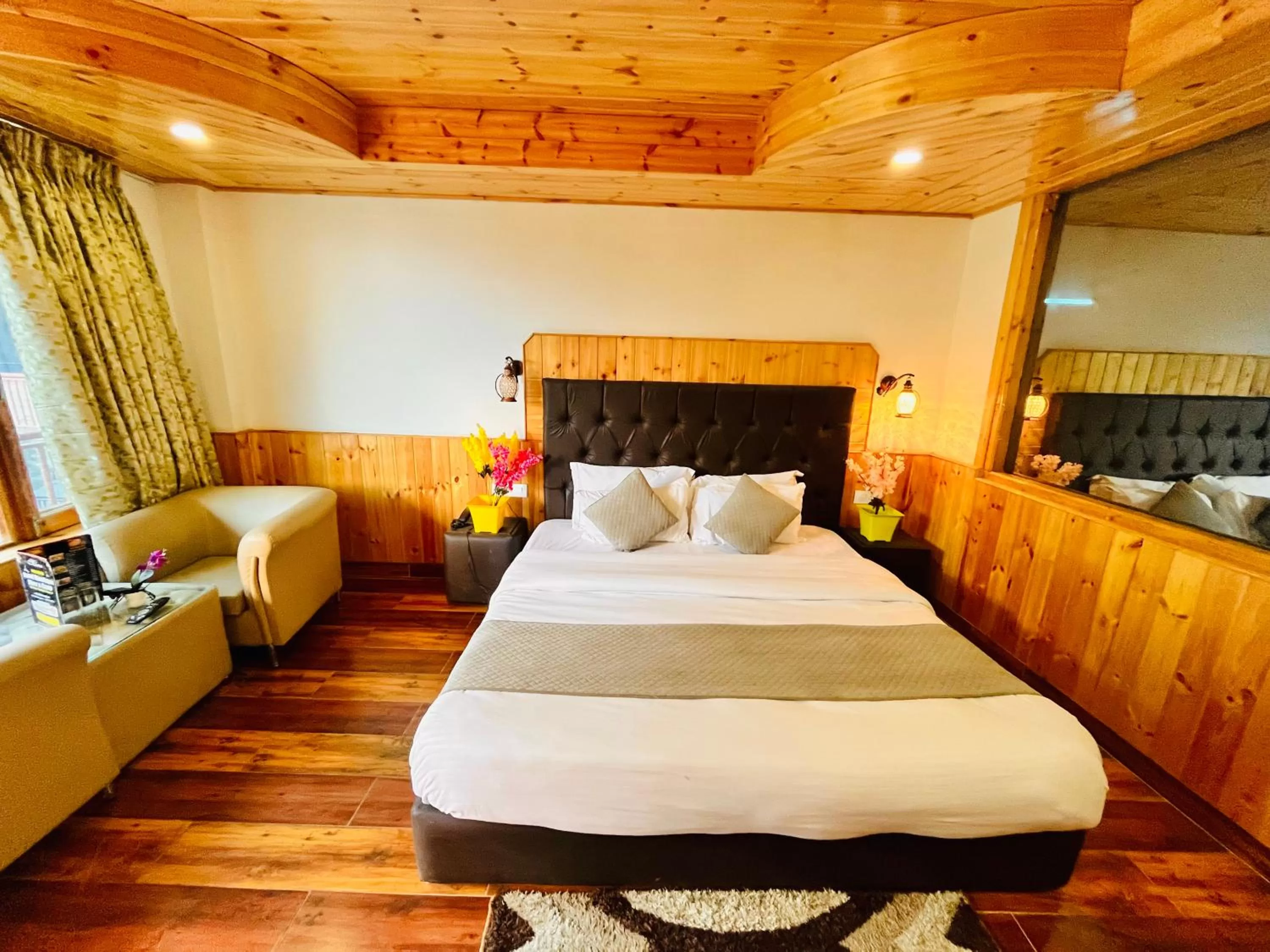 Bed in Himalayan Riverside Resort, Manali