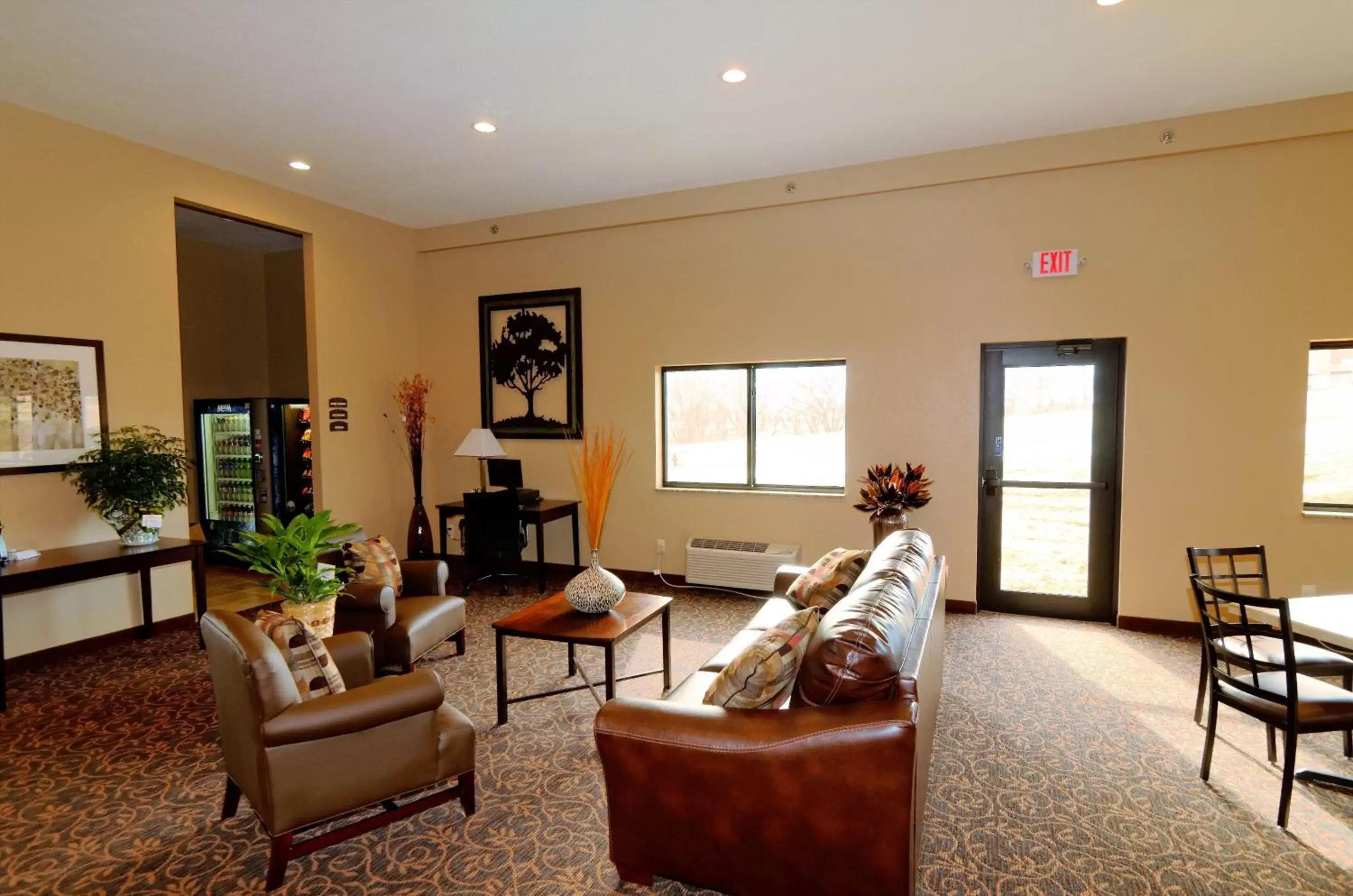 Lobby or reception, Seating Area in Cobblestone Inn & Suites - Denison | Oak Ridge