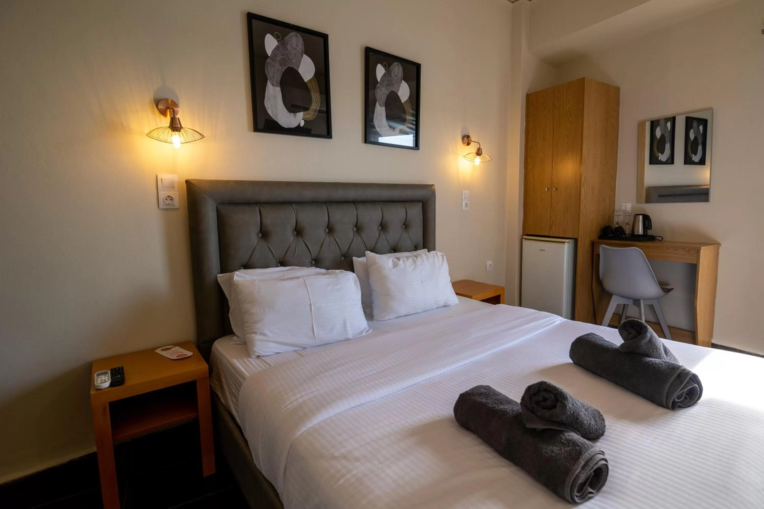 Bed in Votsalakia Hotel & Luxury Apartments