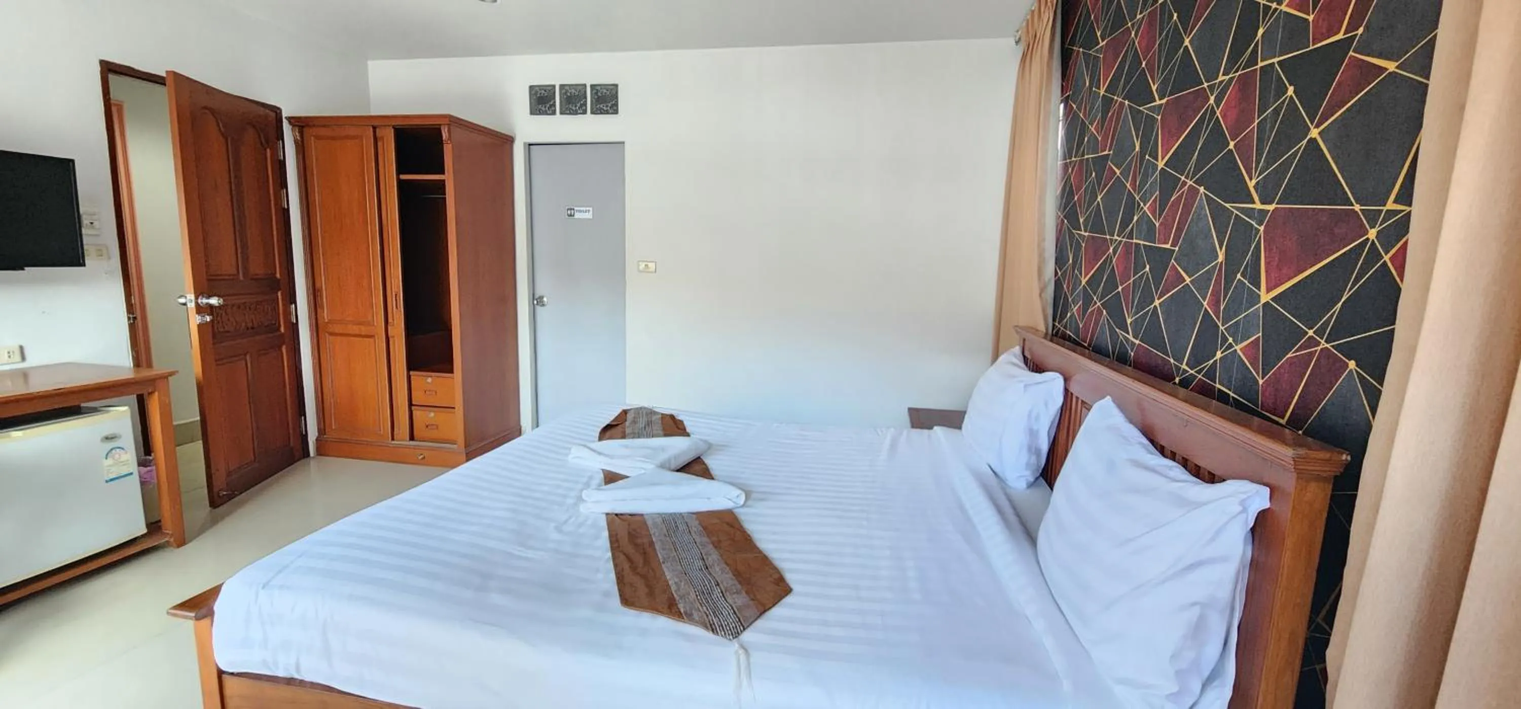 Bed in Royal Sweet Hotel