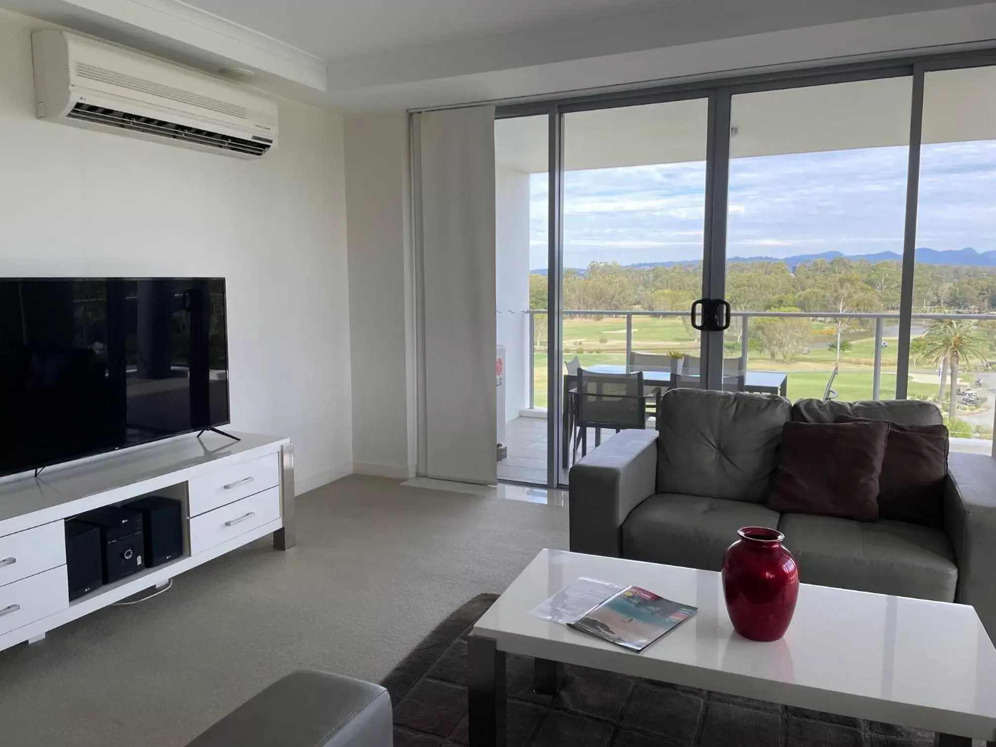 TV and multimedia, Seating Area in Signature Waterfront Apartments