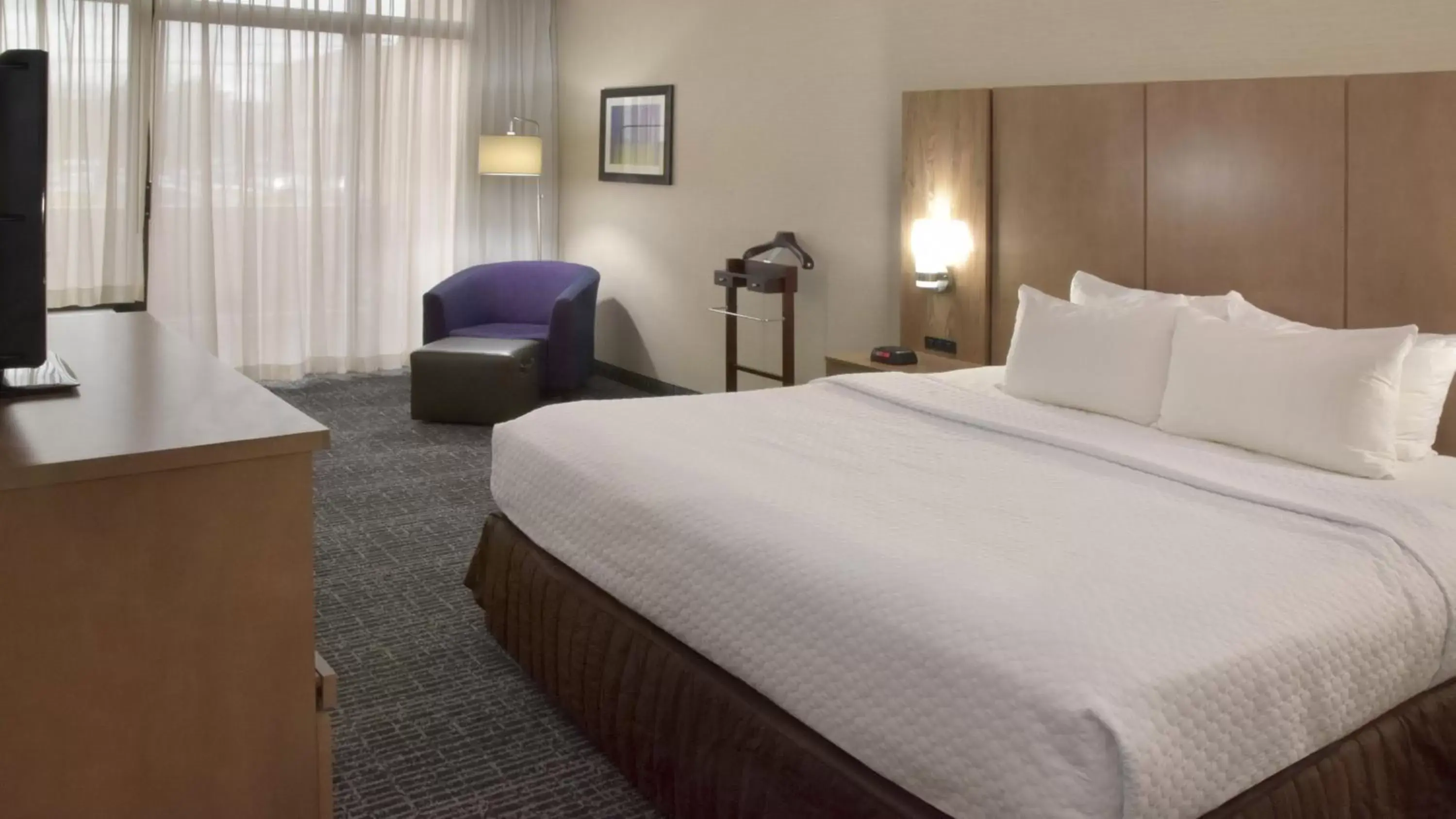 Photo of the whole room, Bed in Crowne Plaza Cleveland Airport, an IHG Hotel