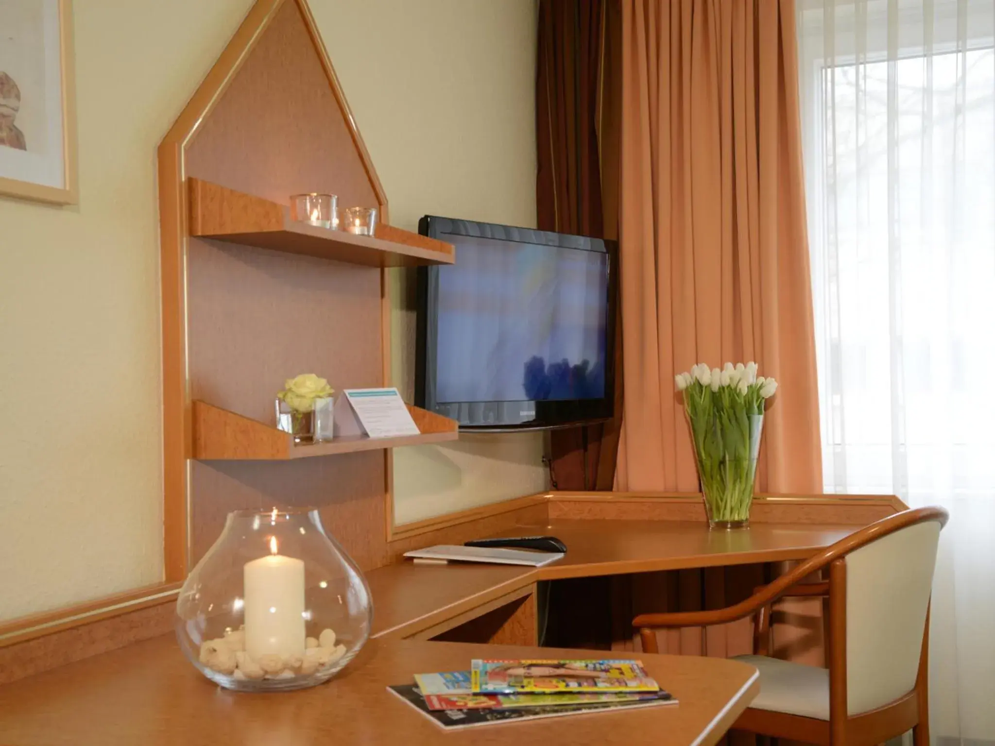 Seating area, TV/Entertainment Center in Hotel Residenz Oberhausen