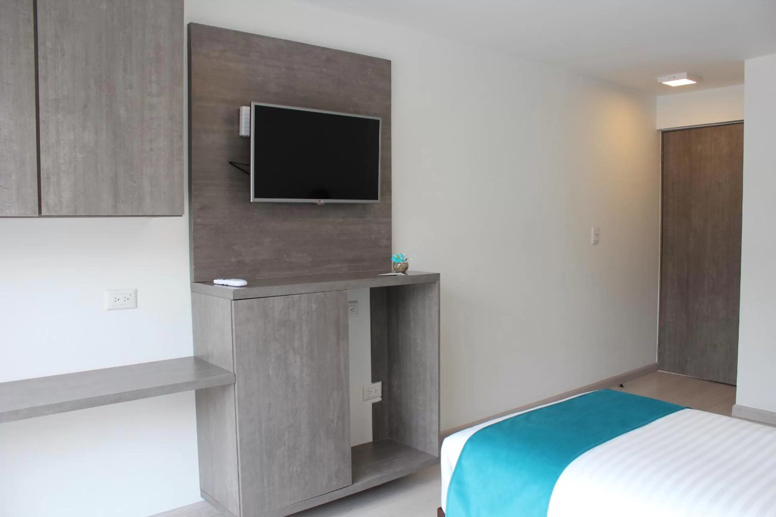 Bed in Agora Suites Self-Service Boutique Hotel