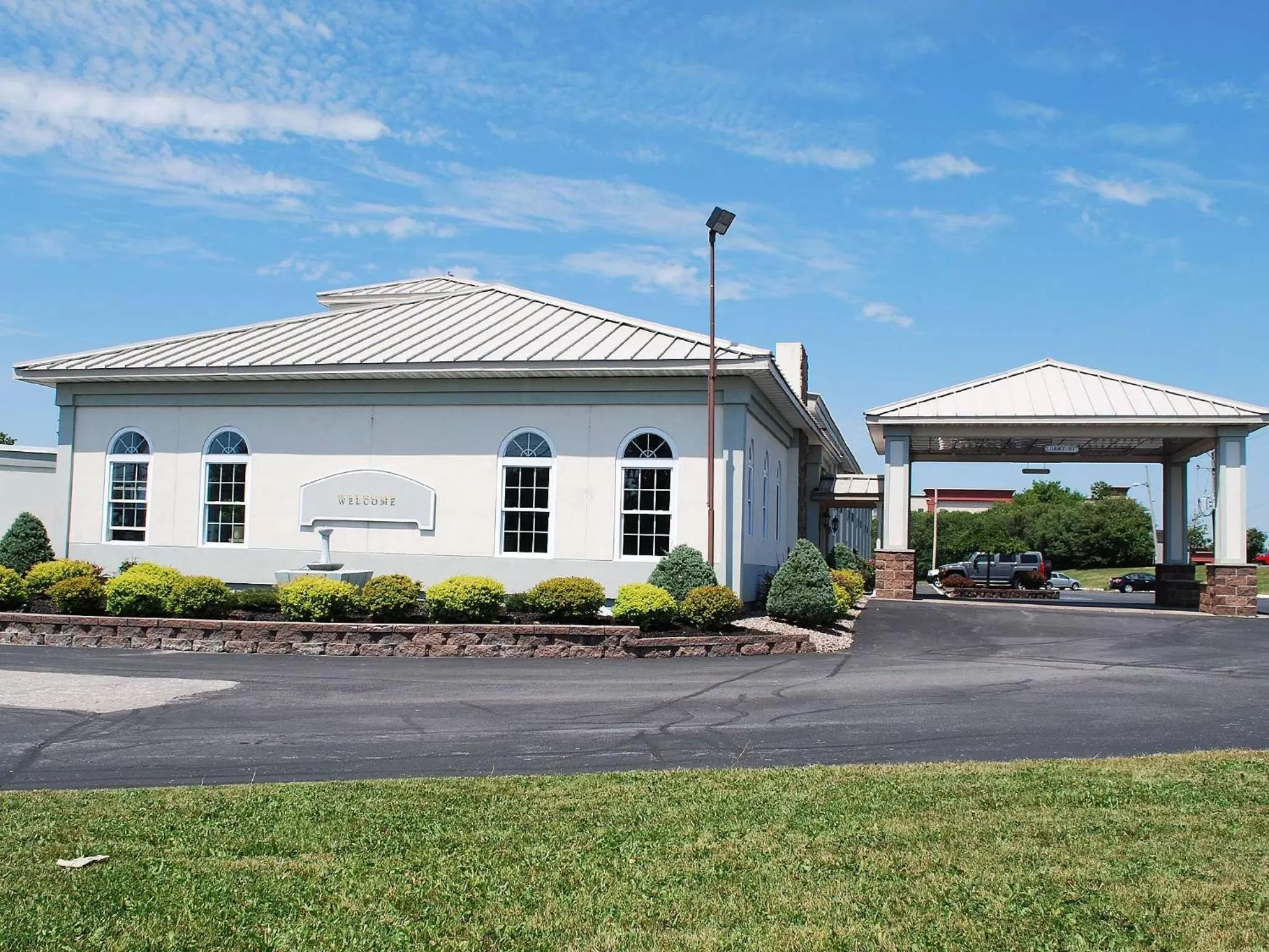 Property building in Travel Inn - Watertown NY