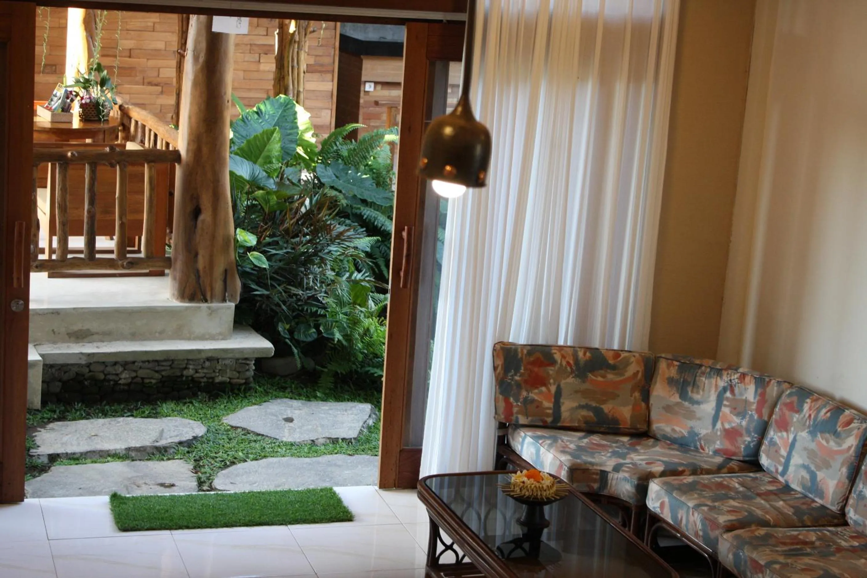 Living room in Graha Sandat Villas by GenuineHost