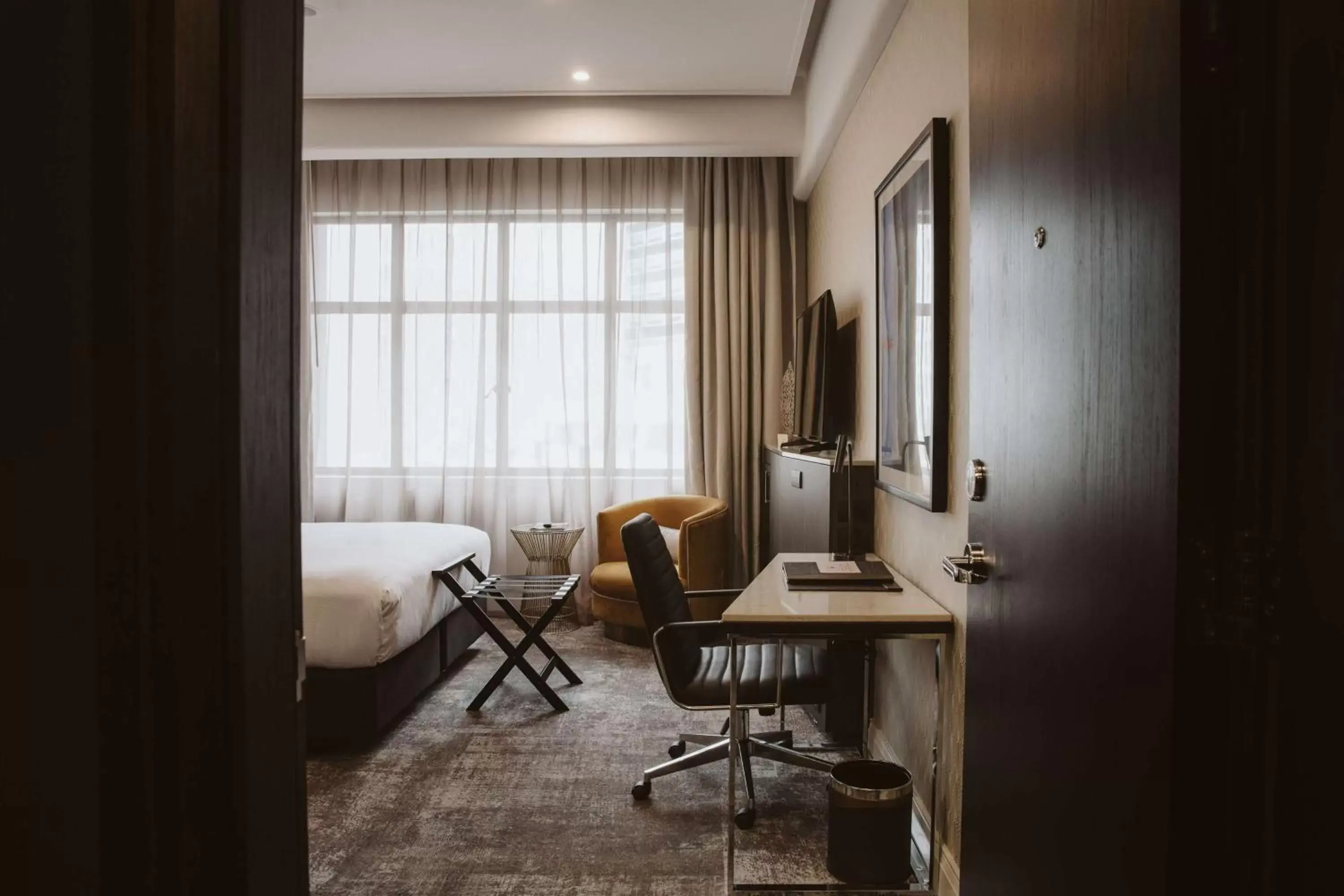 Bed, Seating Area in Doubletree By Hilton Wellington