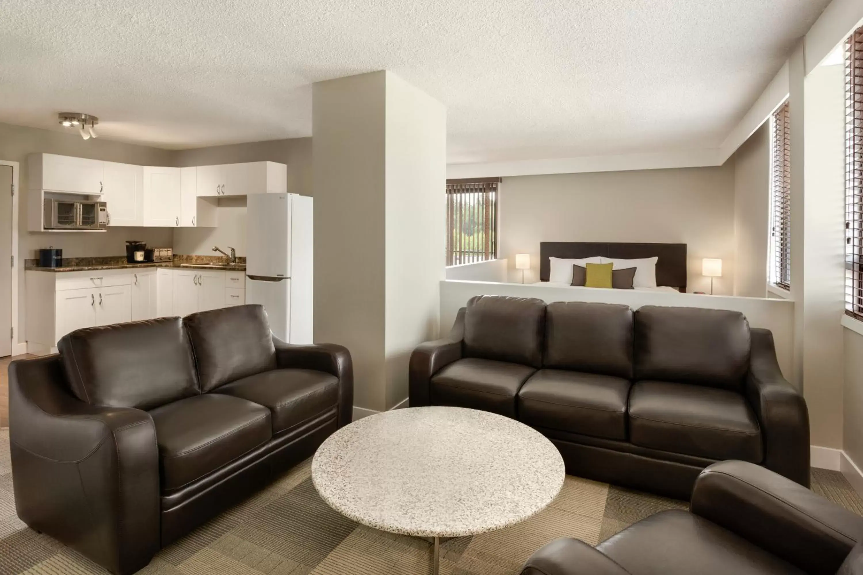 Kitchen or kitchenette, Seating Area in Coast Prince George Hotel by APA