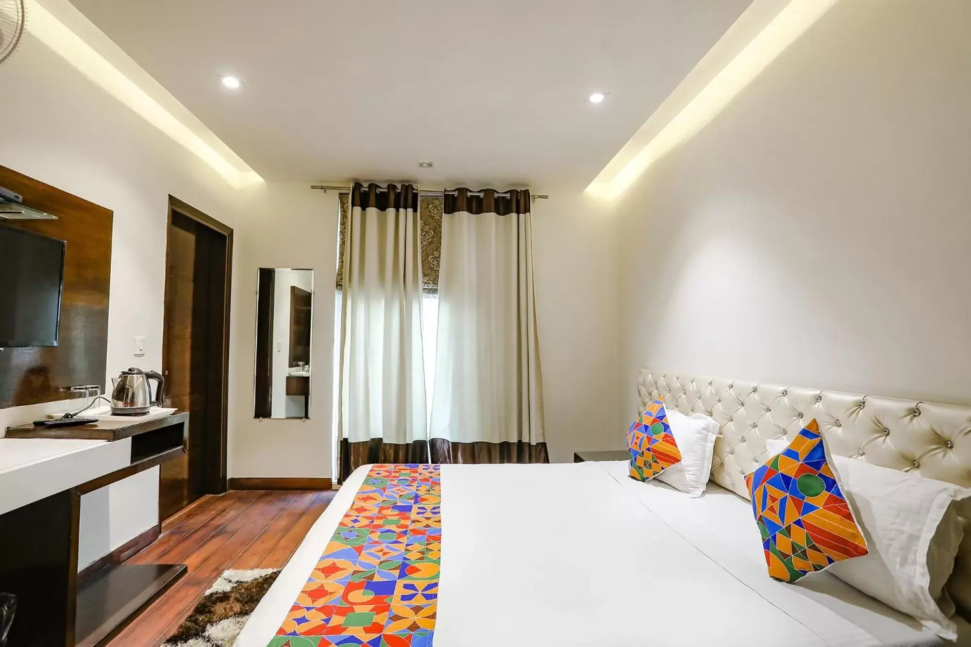 Communal lounge/ TV room, Bed in FabHotel Grand Stay Communal lounge/ TV room, Bed in FabHotel Grand Stay