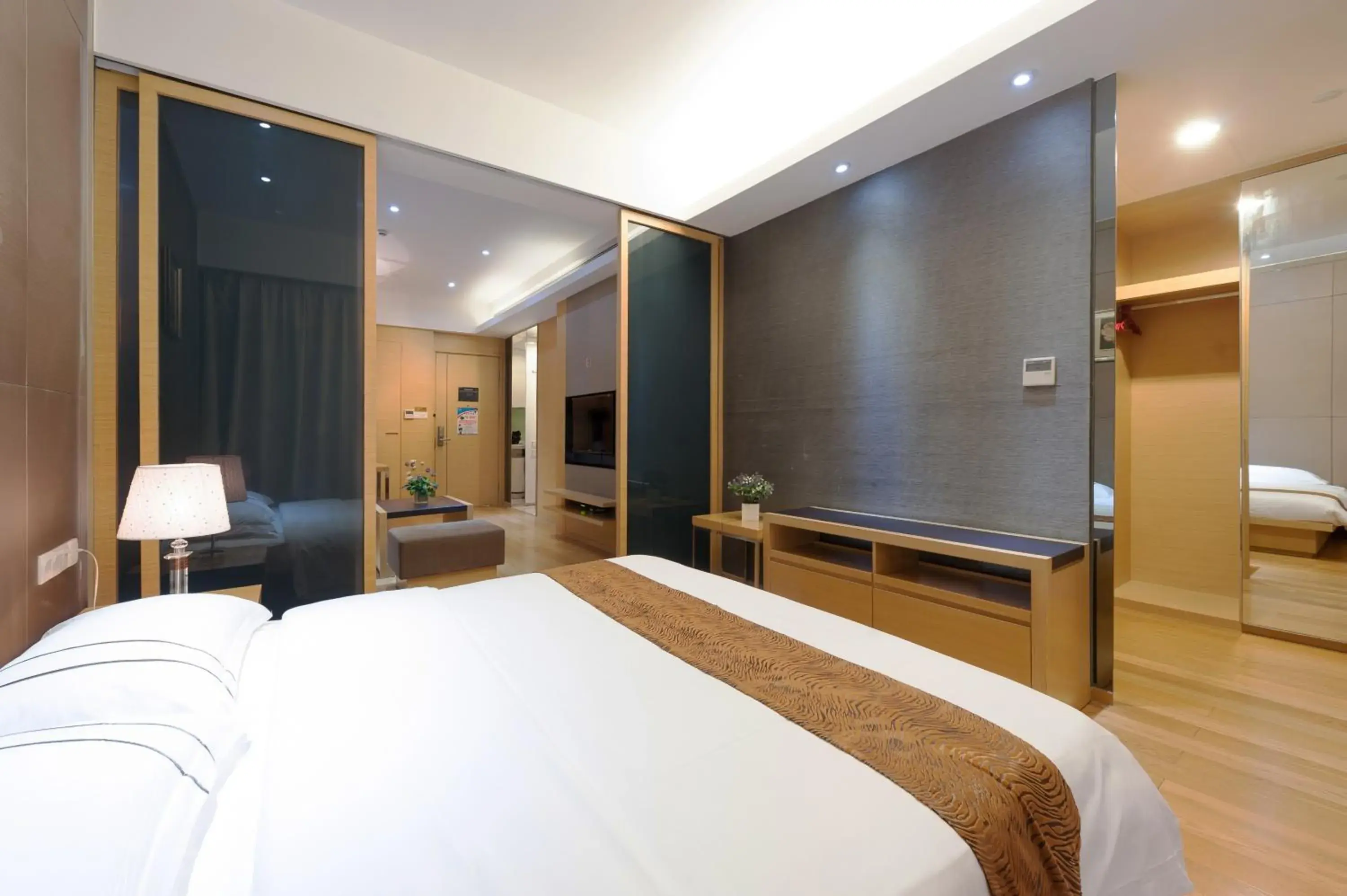 Bedroom, Bed in Yicheng Pazhou Poly World Trade Centre Apartment