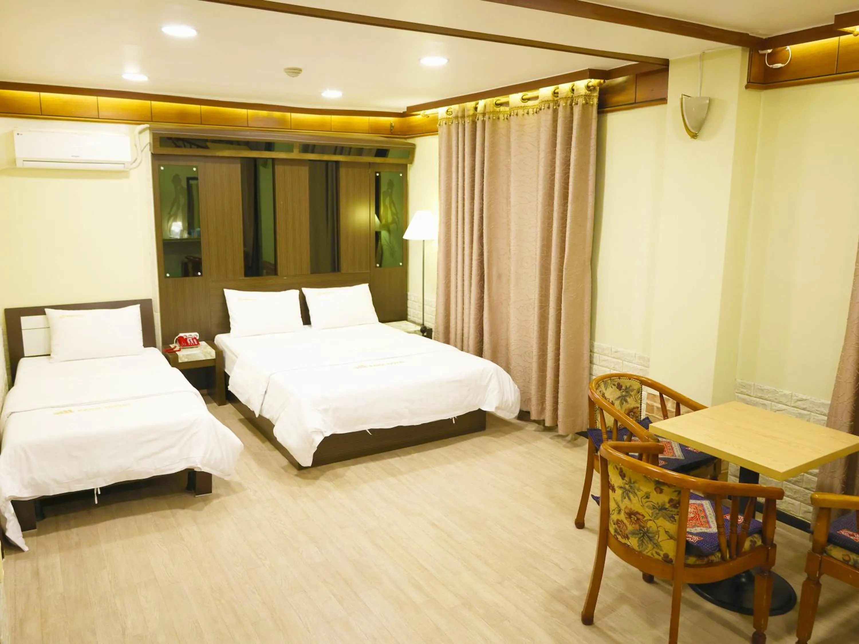 Bed in Goodstay Andong Park Hotel