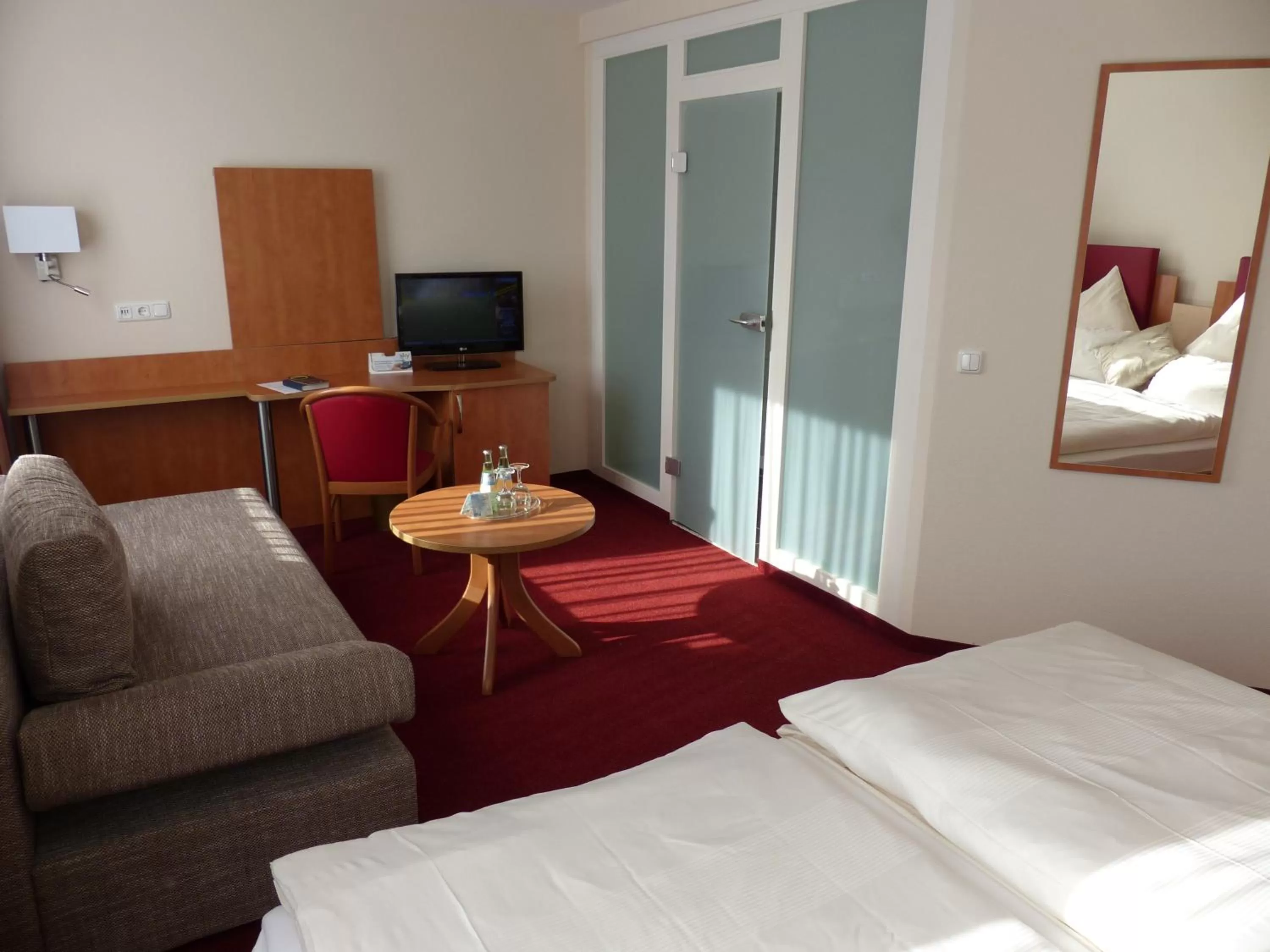 Photo of the whole room, Bed in City Hotel by celina