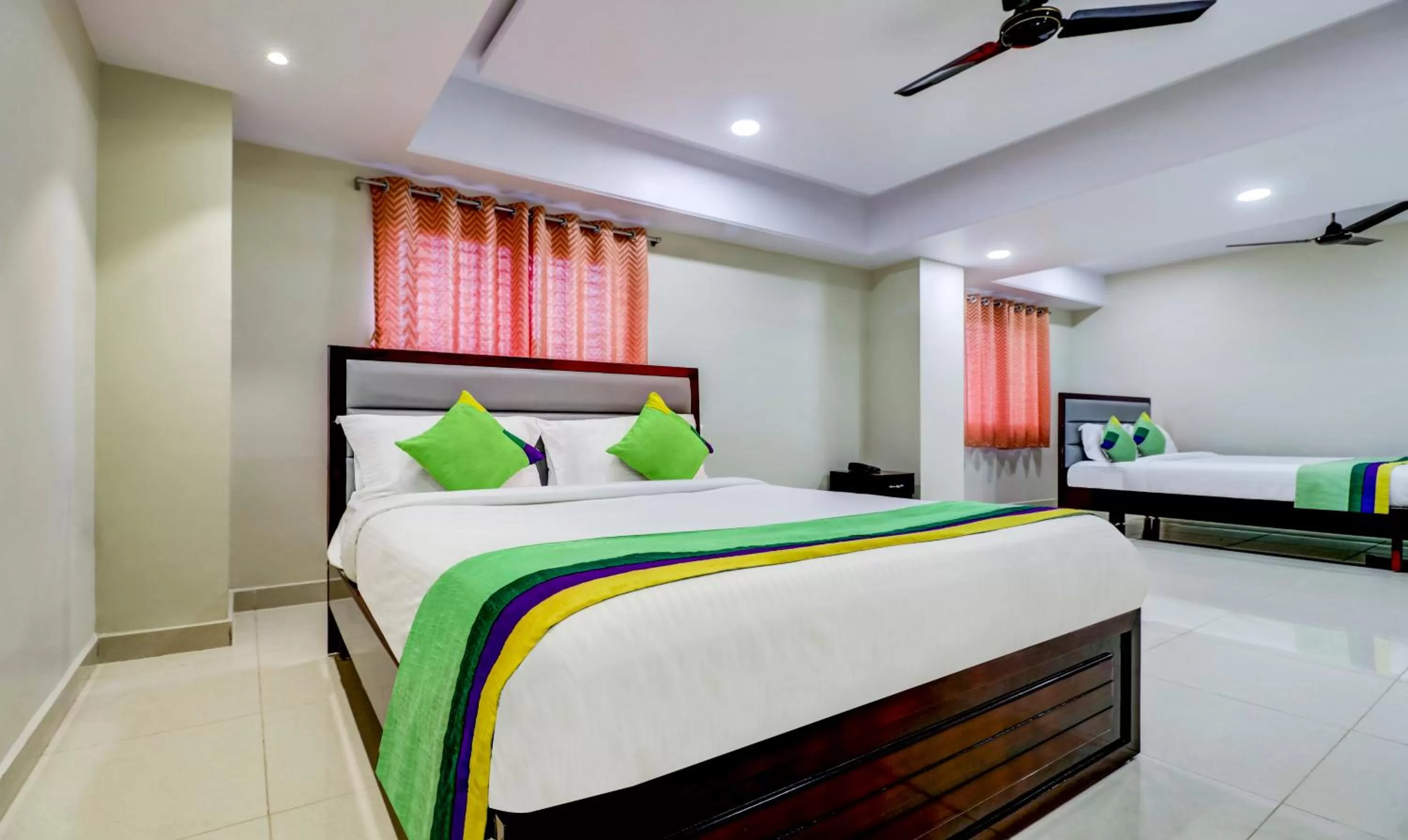 Bedroom, Bed in Treebo Grand Milan