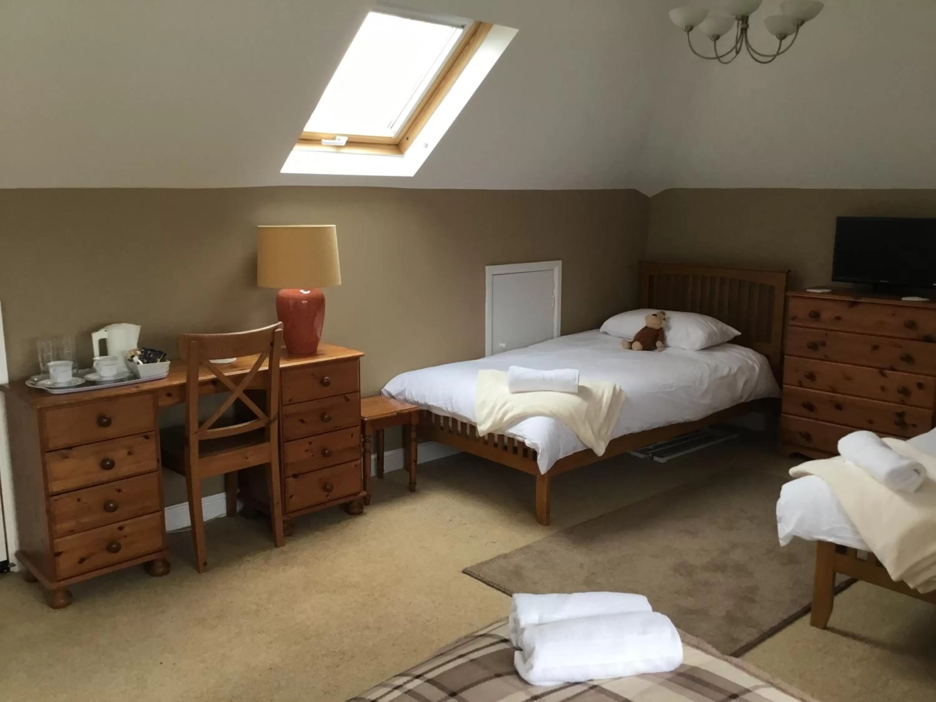 Bed in TRETHEWEY GUEST HOUSE